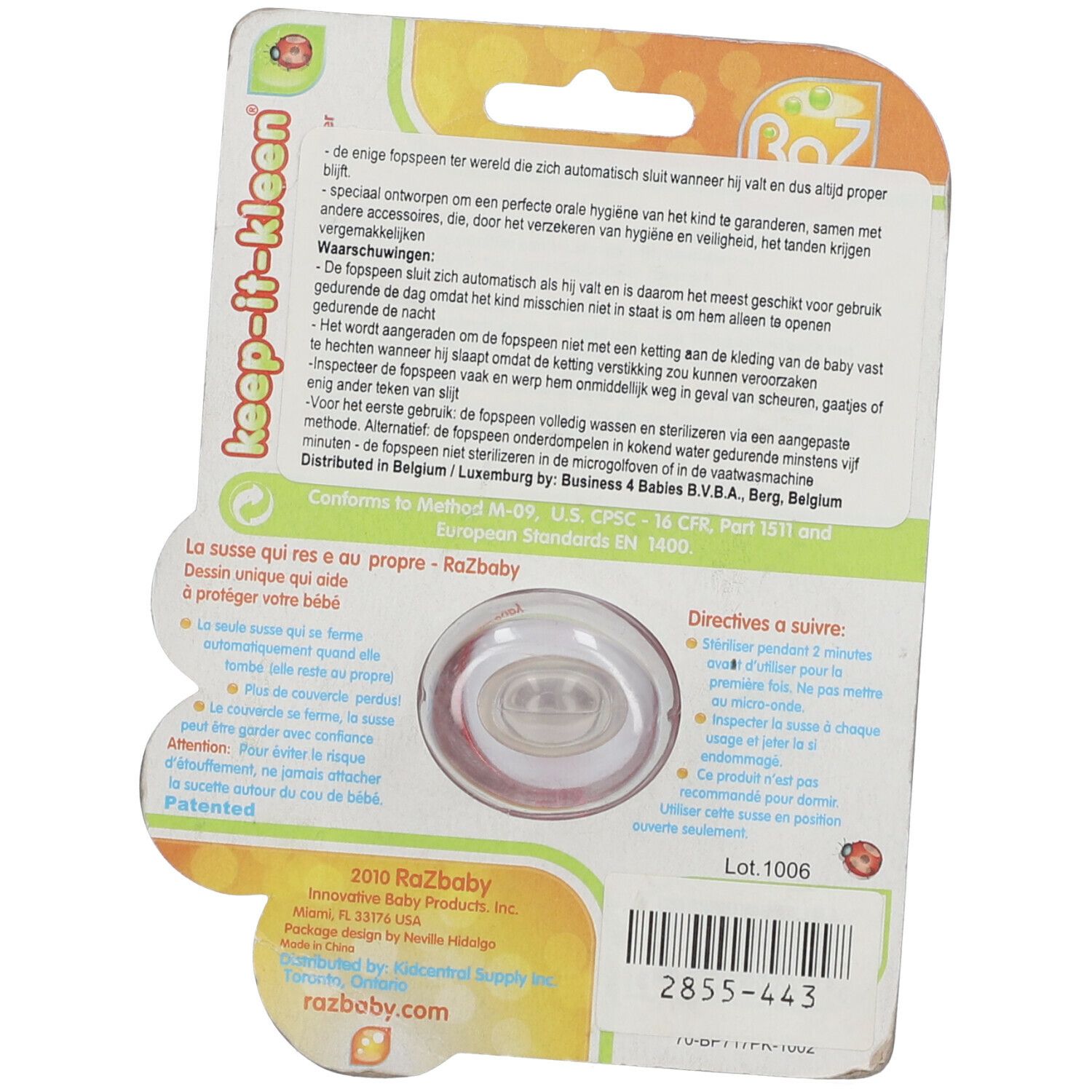 Rückseite der Pacifier-Verpackung. Text, Marke Raz Baby, Warnhinweise, Lot-Nummer, Barcode.