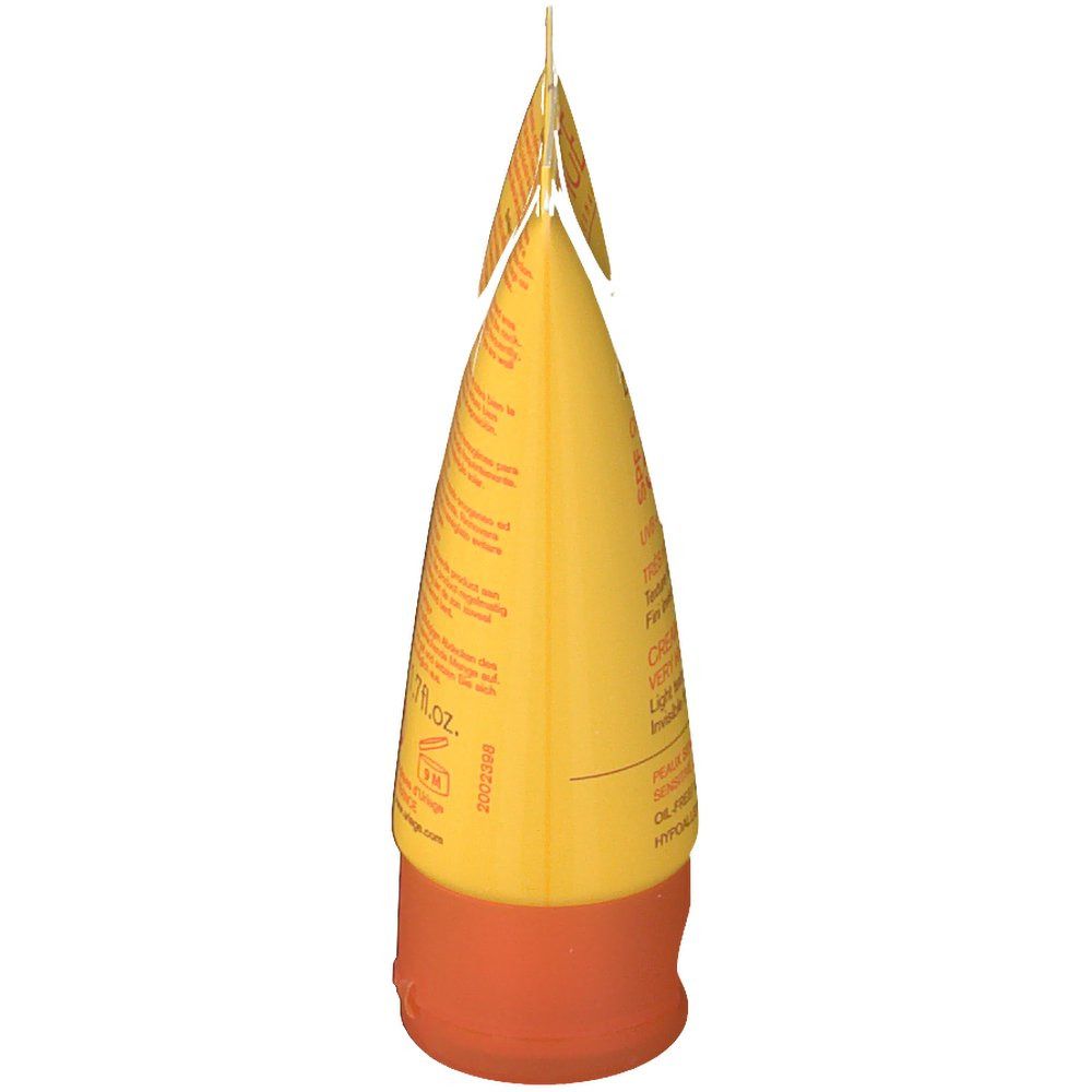 Gelbe Tube, orangefarbener Verschluss. Produktinformationen auf der Tube.