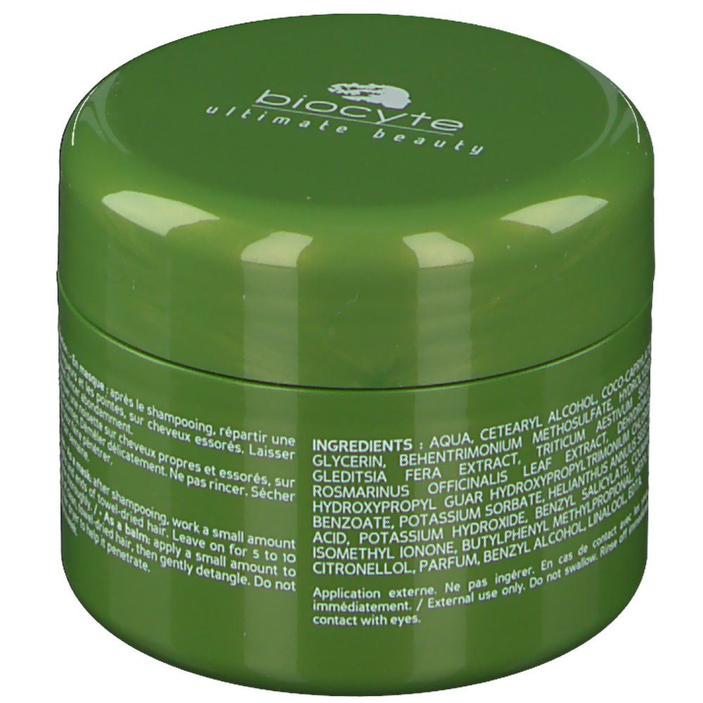 Pot vert avec texte. Inscription: Ingrédients, Aqua, Cetearyl Alcohol, Glycérine, etc.