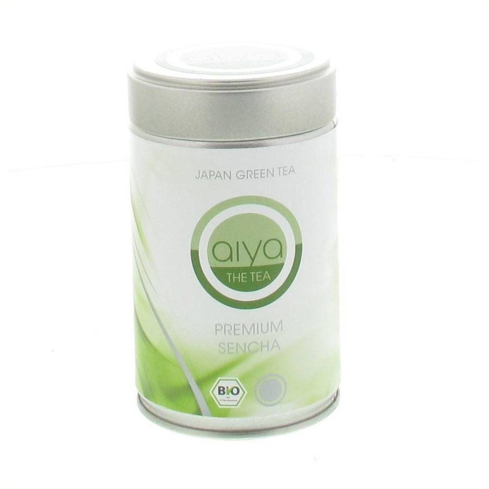 Boîte cylindrique avec couvercle. Inscription : Aiya The Tea, Premium Sencha Bio. Couleurs vert et blanc. Japan Green Tea.