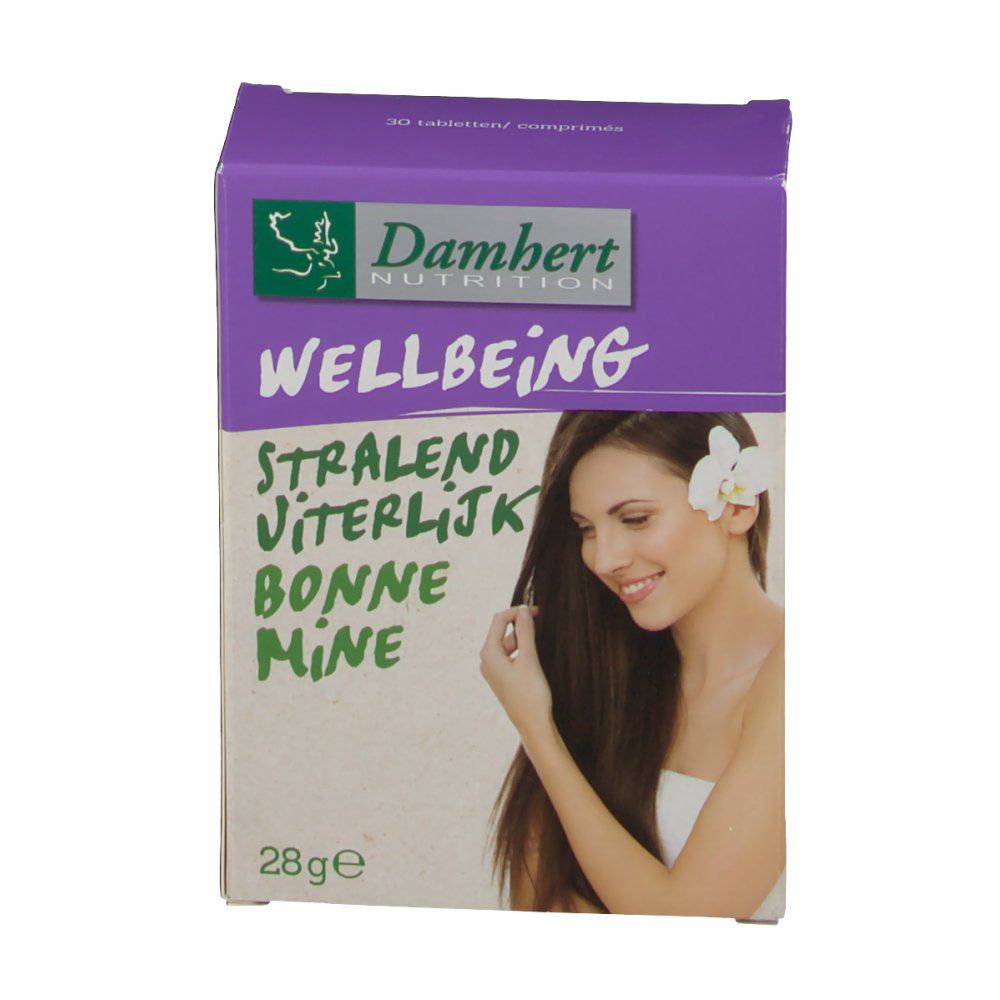 Boîte Damhert Bonne Mine. Couvercle violet, texte vert. Contient des comprimés. Inscription : Wellbeing, Stralend, Viterlijk, Bonne Mine. Femme avec fleur.