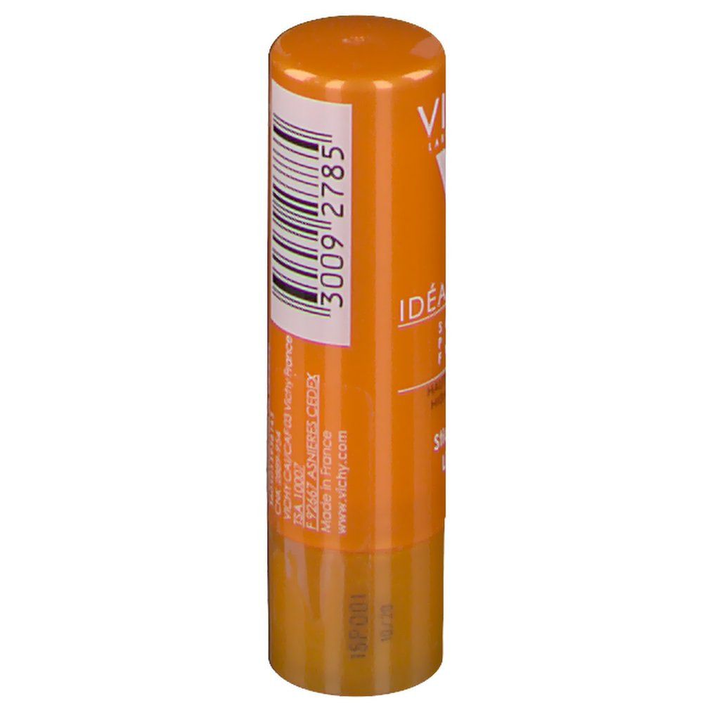 Oranje lippenstiftstick. Streepjescode en tekst. Opschrift: VICHY, Idéal Soleil, SPF 30.