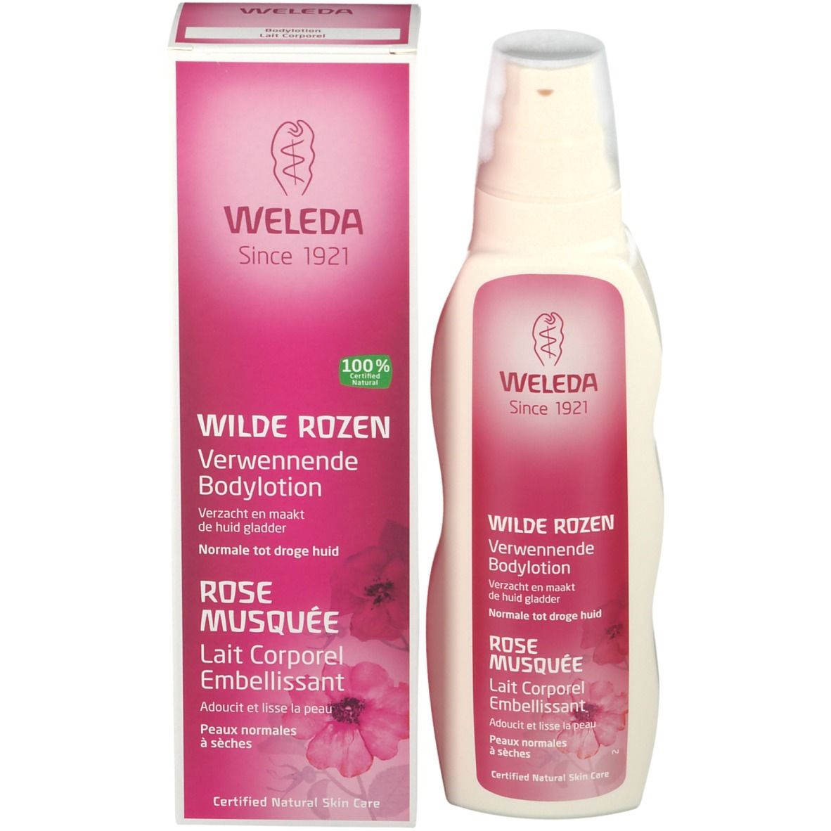 Flacon et boîte de lotion corporelle Weleda. Flacon et boîte avec étiquettes roses. Texte: Wilde Rozen, Rose Musquée.
