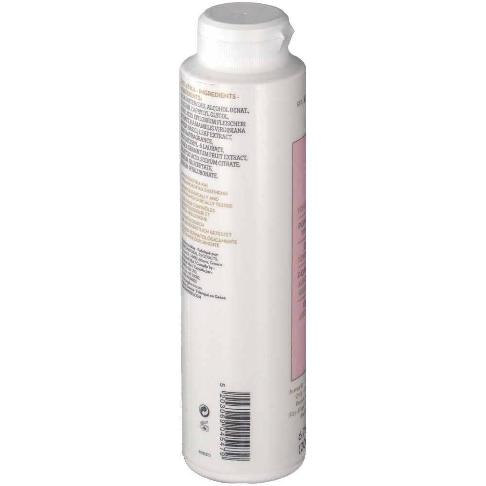 KORRES® Grenade Toner. Bouteille blanche avec étiquette rose. Texte et ingrédients imprimés. Bouchon blanc.