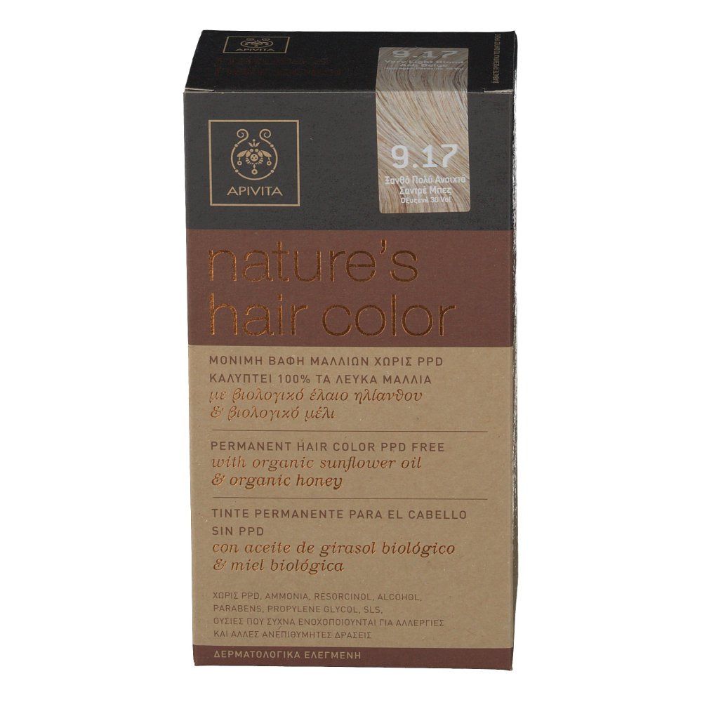 Haarfarben-Verpackung. Aufschrift: Apivita, Nature's Hair Color, 9.17 Blond Très Clair Cendre Beige. PPD-frei, mit Bio-Sonnenblumenöl und Bio-Honig.