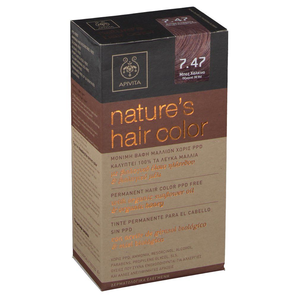 Boîte de coloration capillaire Apivita. Teinte 7.47 Beige Cuivre. Inscription: nature's hair color. Coloration permanente sans PPD.