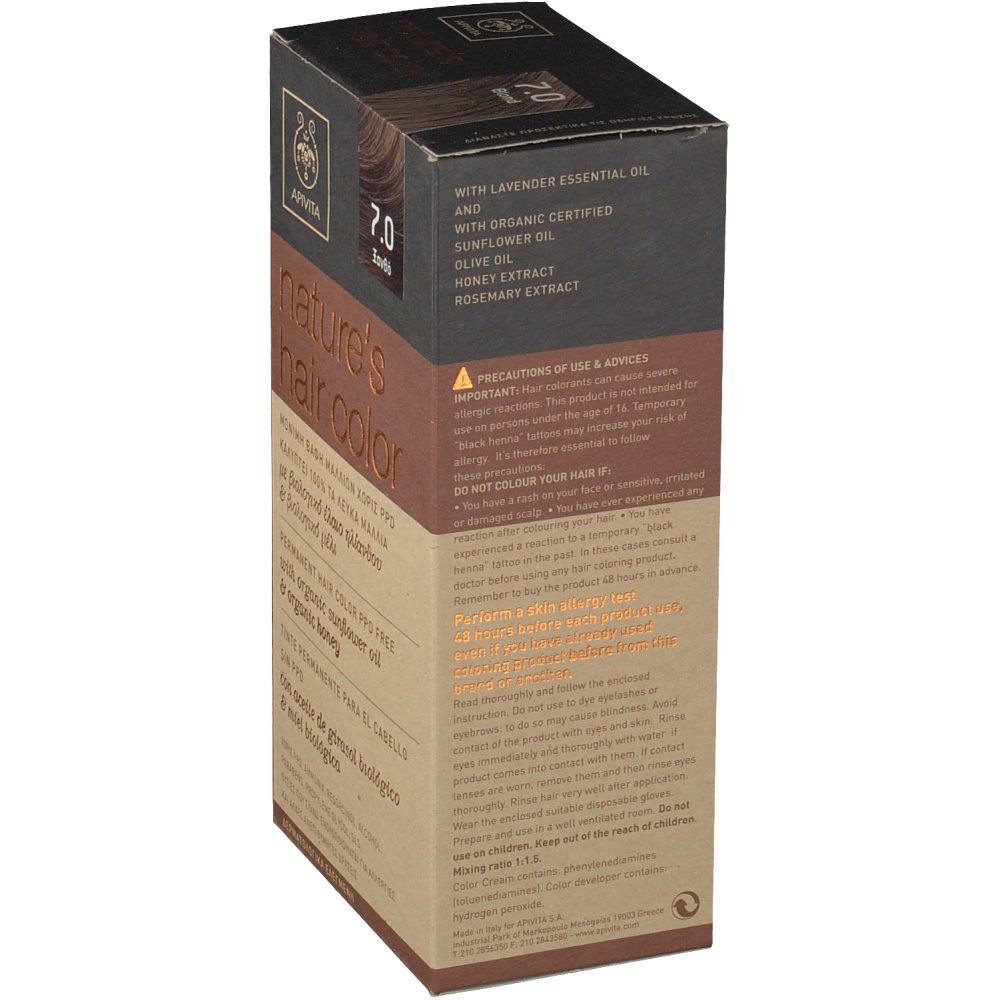 Boîte de coloration capillaire Apivita. Côté avec texte. Contient de l'huile de lavande, de tournesol, d'olive, extrait de miel et de romarin.
