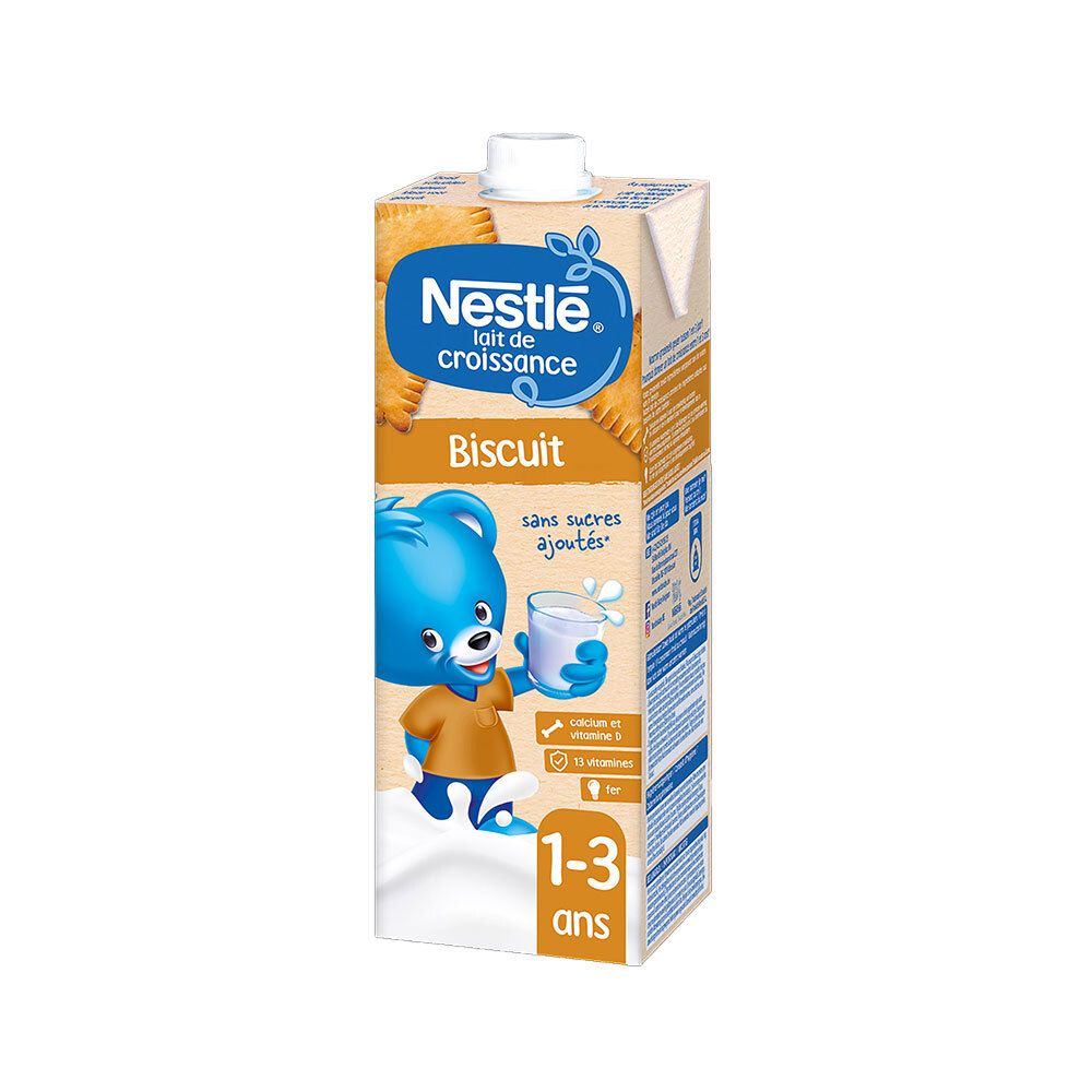 Brique Nestlé Lait de Croissance Biscuit, sans sucres ajoutés. Inscription : 1-3 ans. Ours bleu tenant un verre de lait.