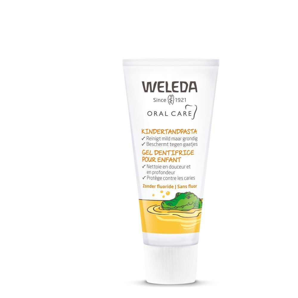 Weleda Kinder Zahnpasta Tube. Weiß, mit gelbem Bereich. Text: Kinderzahnpasta, Gel Dentifrice pour enfant. Logo: Krokodil.