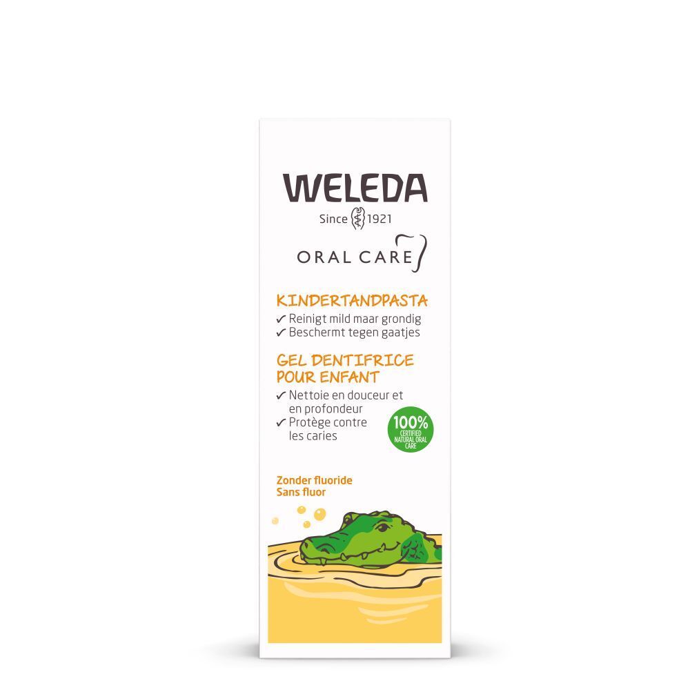 Weleda Kinder Zahnpasta Verpackung. Weiß, mit gelbem Bereich. Text: Kinderzahnpasta, Gel Dentifrice pour enfant. Logo: Krokodil.