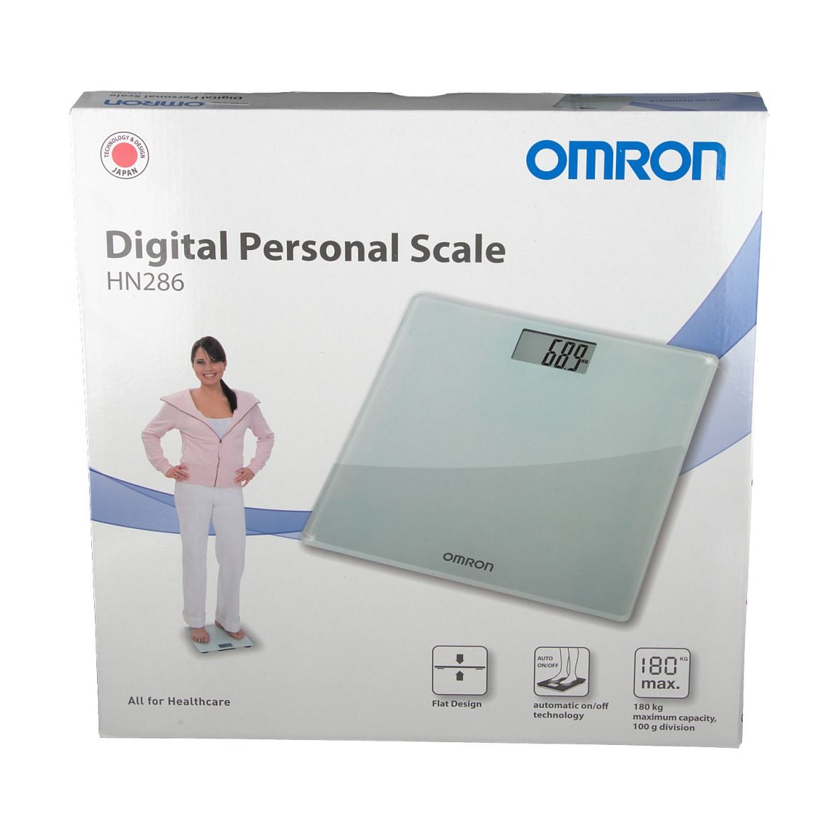 Verpakking van de OMRON HN286 digitale personenweegschaal. Display 68,9. Vrouw op weegschaal. Plat ontwerp, 180 kg max.