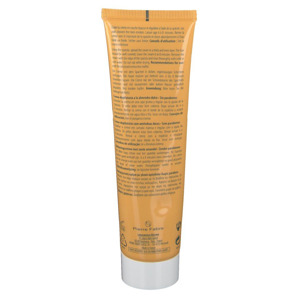 Dos du tube de crème dépilatoire KLORANE. Tube jaune avec bouchon blanc. Texte multilingue.