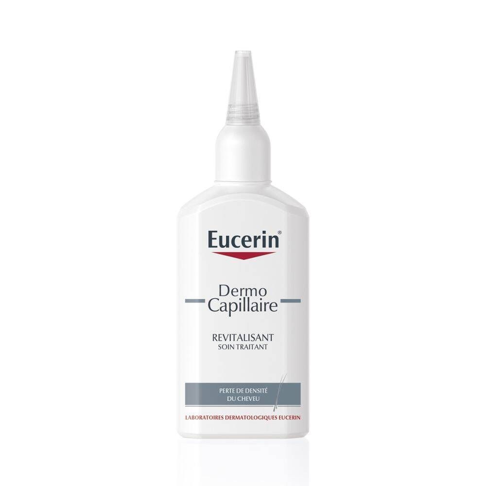 Flacon blanc avec applicateur. Logo Eucerin et texte DermoCapillaire. Texte: Revitalisant, Soin traitant.