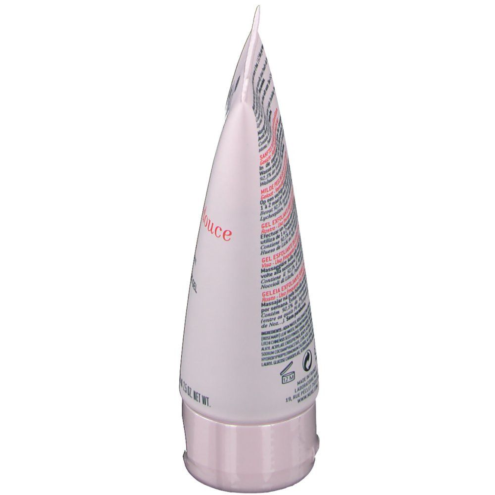 Vue latérale du tube. Tube rose avec texte. Gelée exfoliante douce. Gel exfoliant doux aux pétales de rose. Pour peaux sensibles.