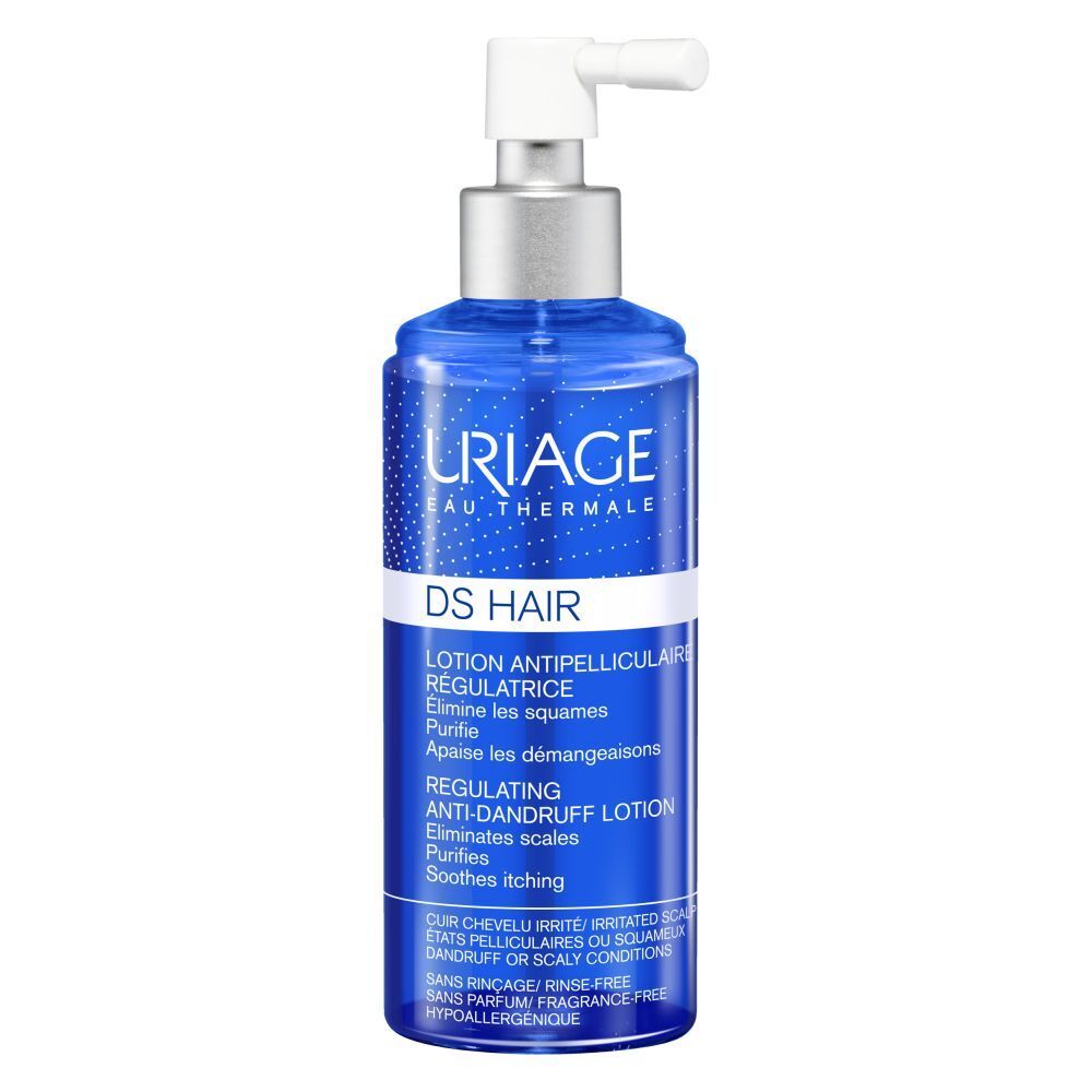 Blauwe fles met spray. Uriage DS Hair Lotion. Tekst in het Frans en Engels.
