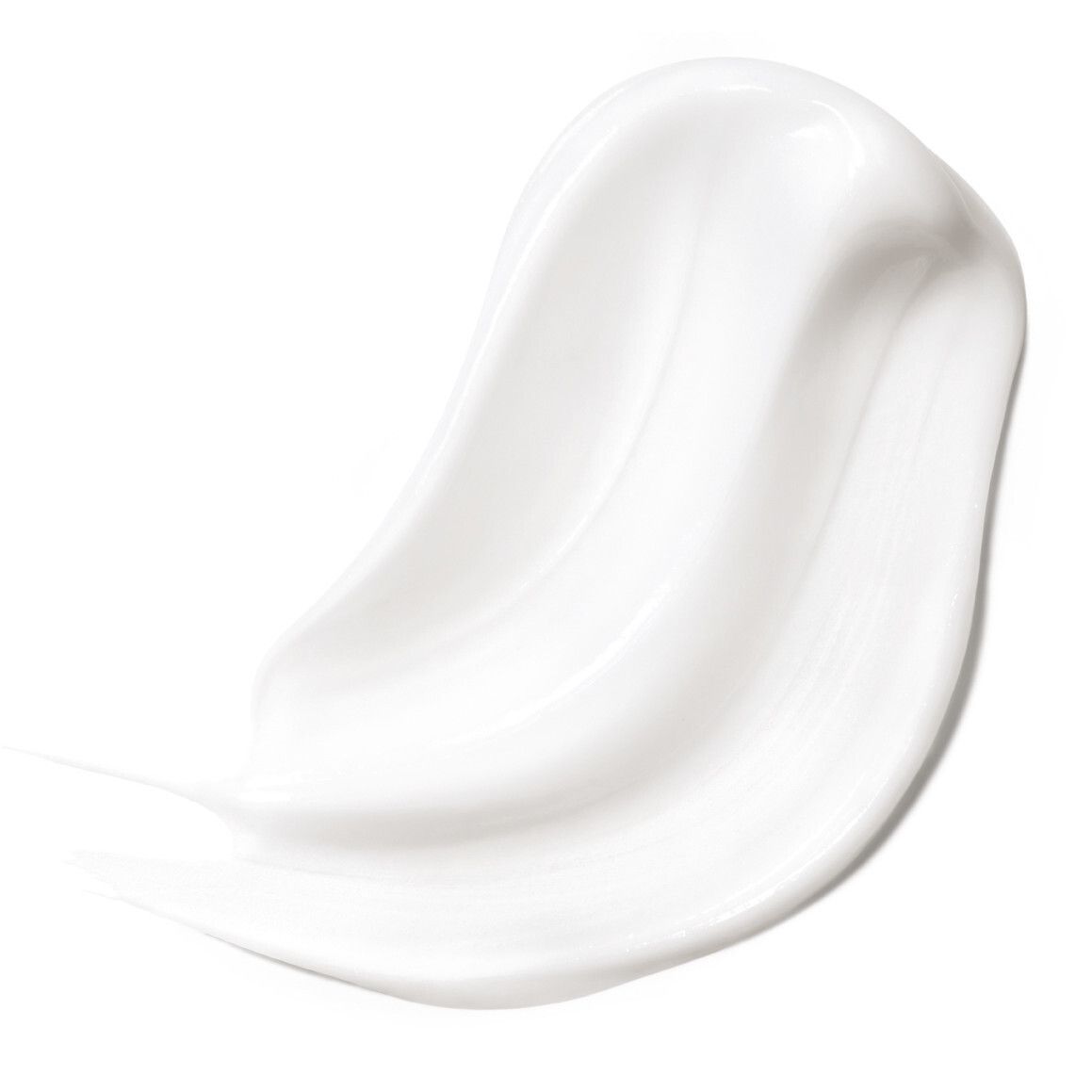 Gros plan d'un baume blanc. Texture lisse et crémeuse.