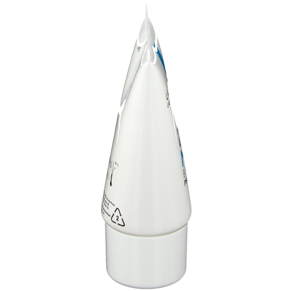 Vue latérale d'un tube blanc. Informations et symboles.