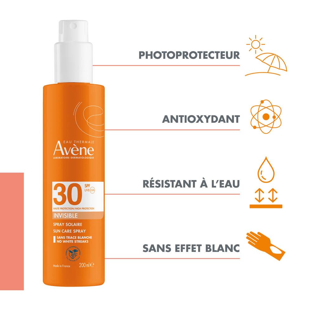 Flacon orange avec bouchon blanc. Inscription: Eau Thermale Avène, SPF 30, Spray.