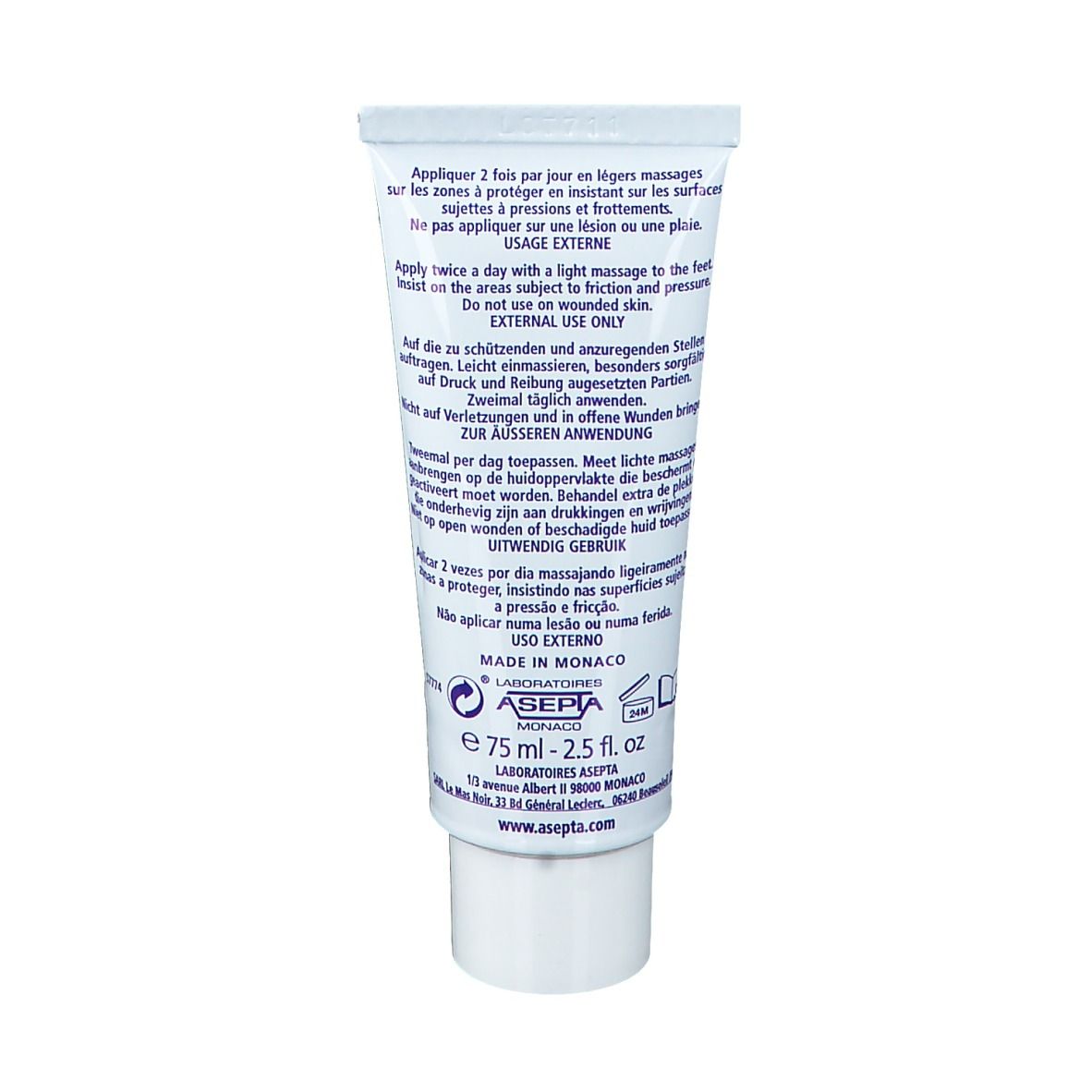 Dos du tube de crème AKILDIA. Texte: Mode d'emploi, ingrédients, 75 ml, 2.5 fl.oz. Fabriqué à Monaco.