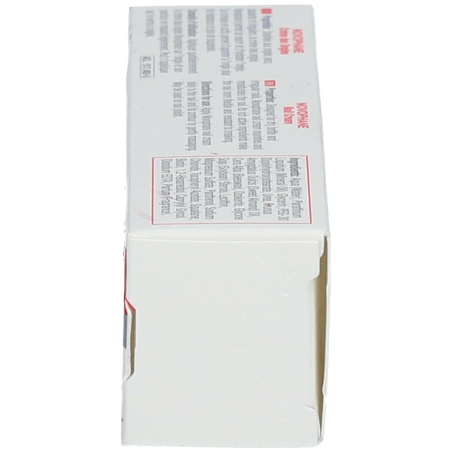 Boîte ACM Novophane Crème des Ongles. Vue latérale. Texte et logos. Blanc avec lettrage rouge et gris.