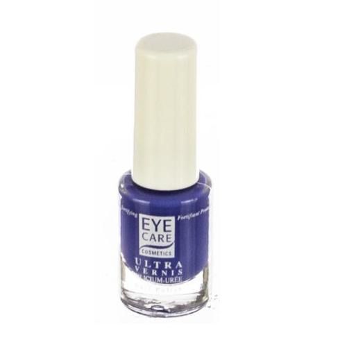 Flacon de vernis à ongles bleu avec bouchon blanc. Inscription : EYE CARE COSMETICS ULTRA VERNIS.
