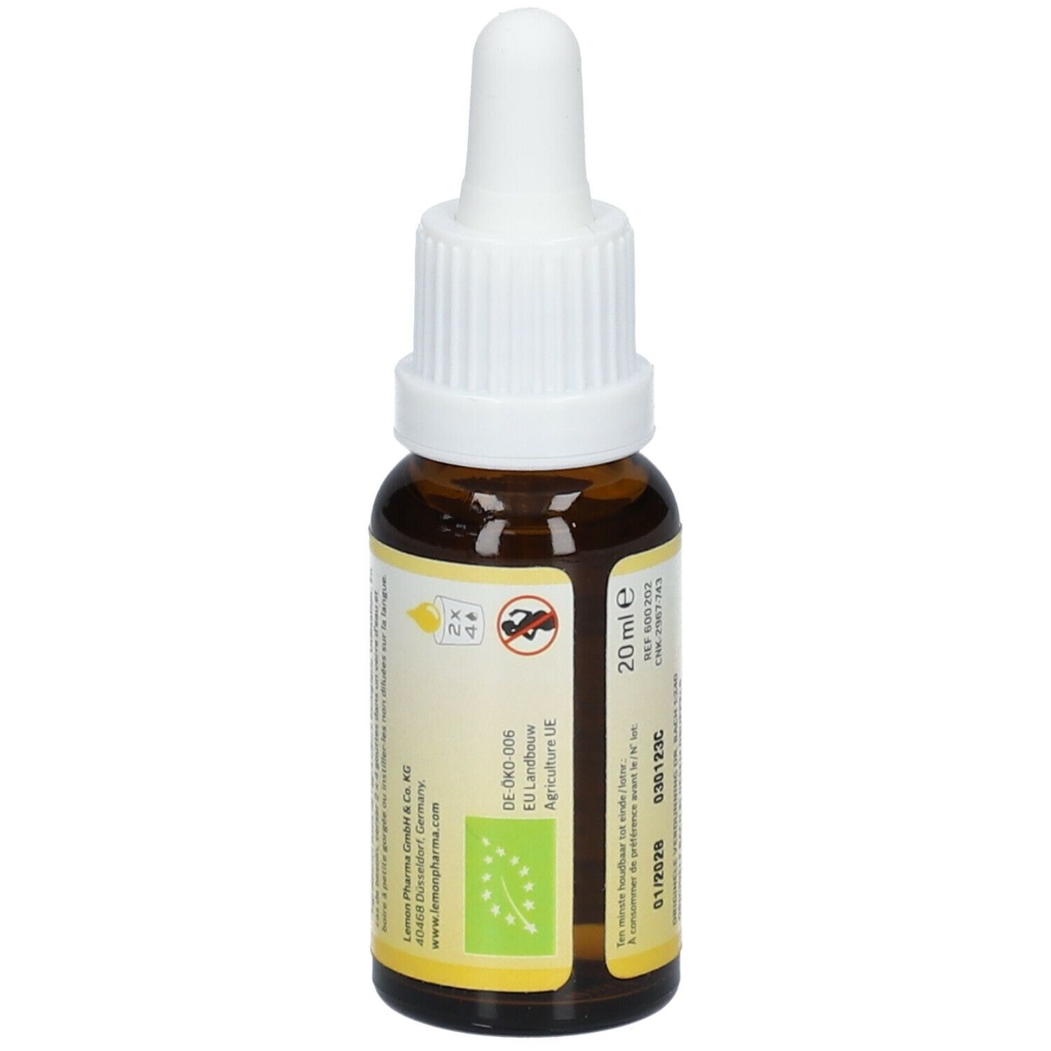Bruine glazen fles met witte dop. Etiket met tekst en logo's. Bevat 20 ml. Druppelfles.