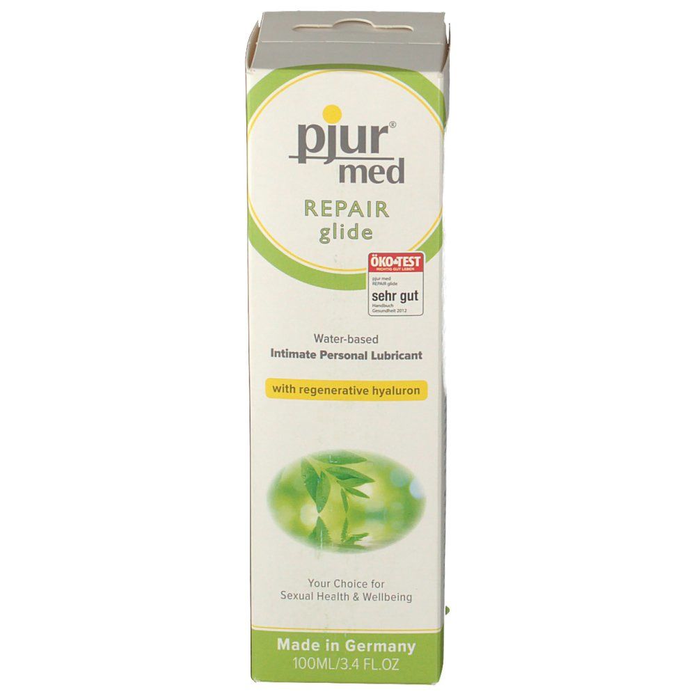 Face avant de l'emballage Pjur med Repair Glide. Boîte verte et blanche avec nom du produit, logo et label ÖKO-TEST. Contient un lubrifiant intime à base d'eau.