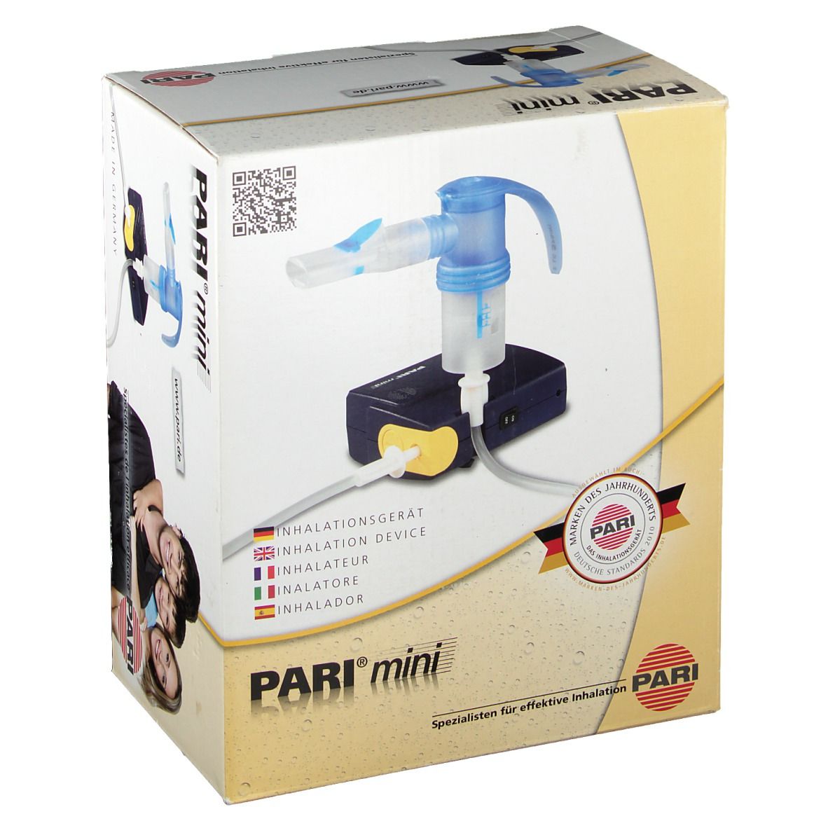Appareil d'inhalation PARI mini dans son emballage. Appareil avec embout buccal bleu, socle noir et accents jaunes. Emballage avec logo et texte.