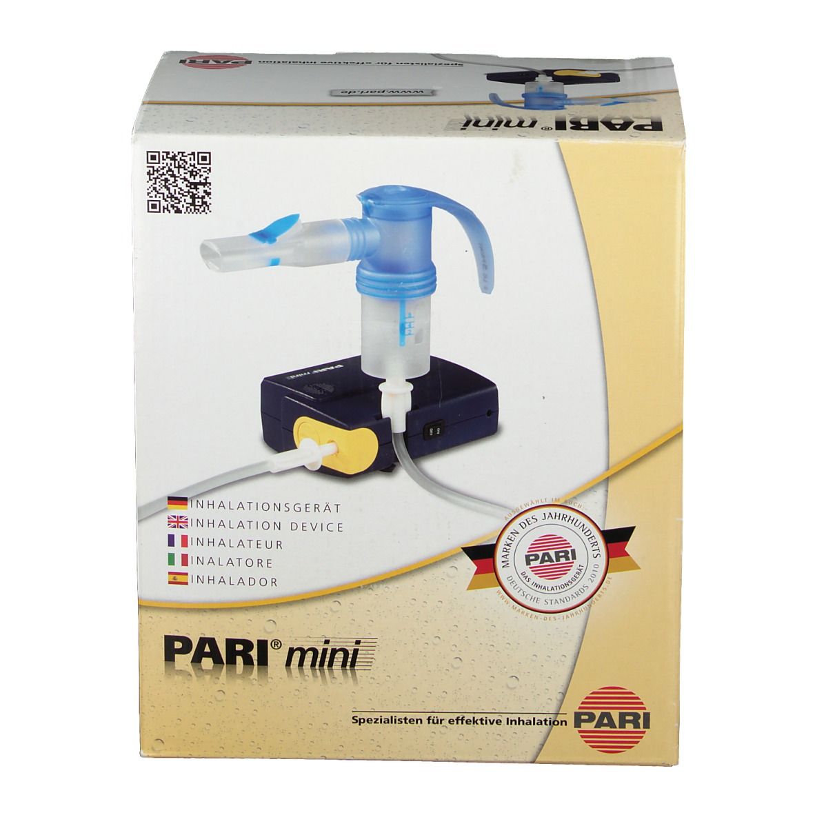 Appareil d'inhalation PARI mini dans son emballage. Appareil avec embout buccal bleu, socle noir et accents jaunes. Emballage avec logo et texte.