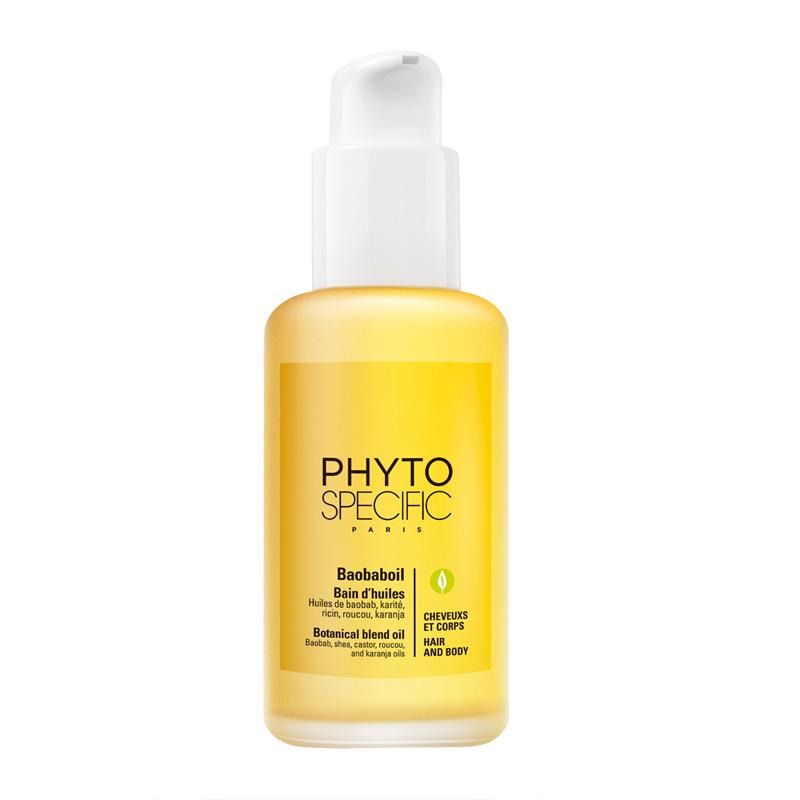Flacon transparent avec liquide jaune et pompe. Inscription PHYTOSPECIFIC. Contient de l'huile de baobab pour cheveux et corps. Pompe blanche.