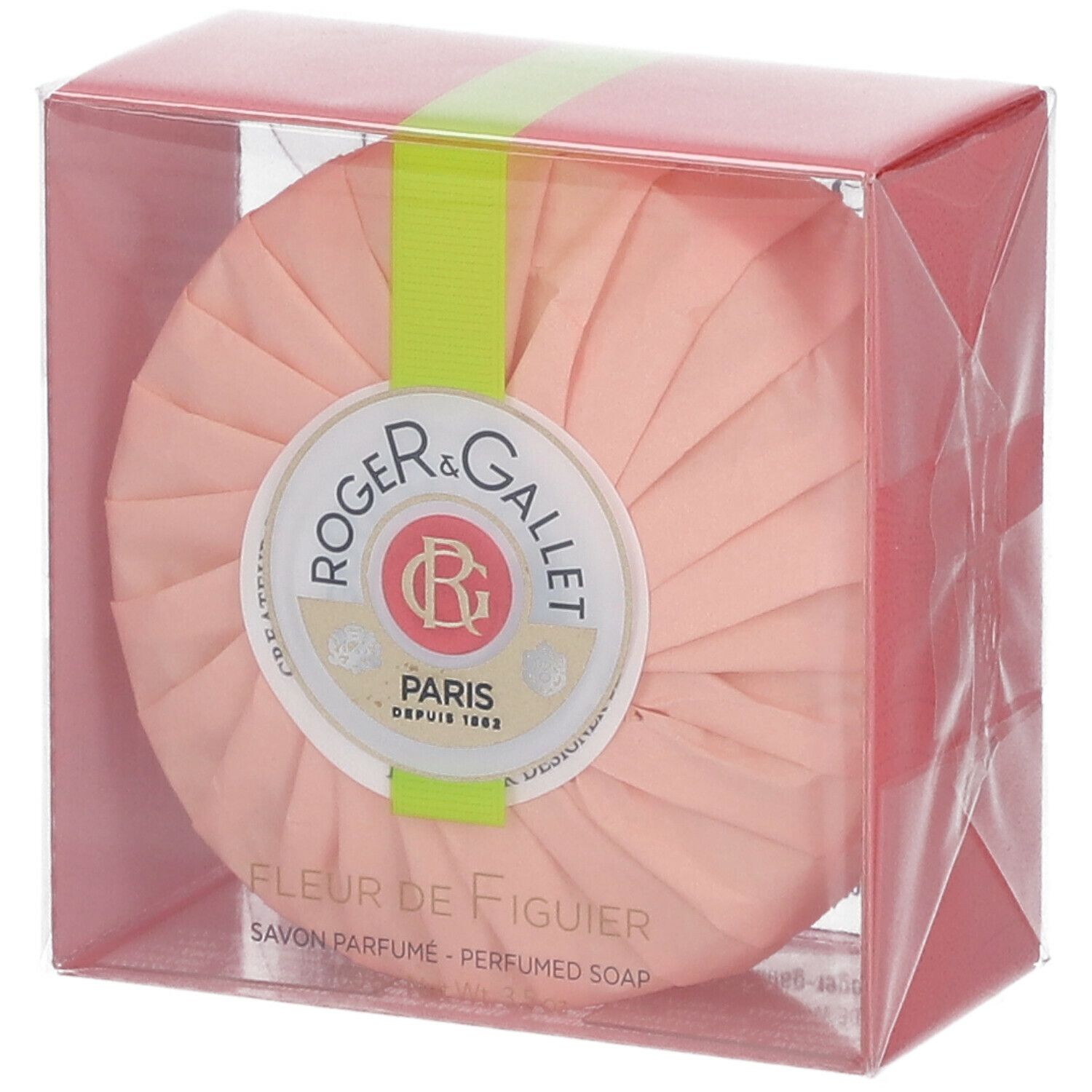 Savon rond rose dans emballage transparent. Ruban vert et logo. Texte: Fleur de Figuier, Savon Parfume.