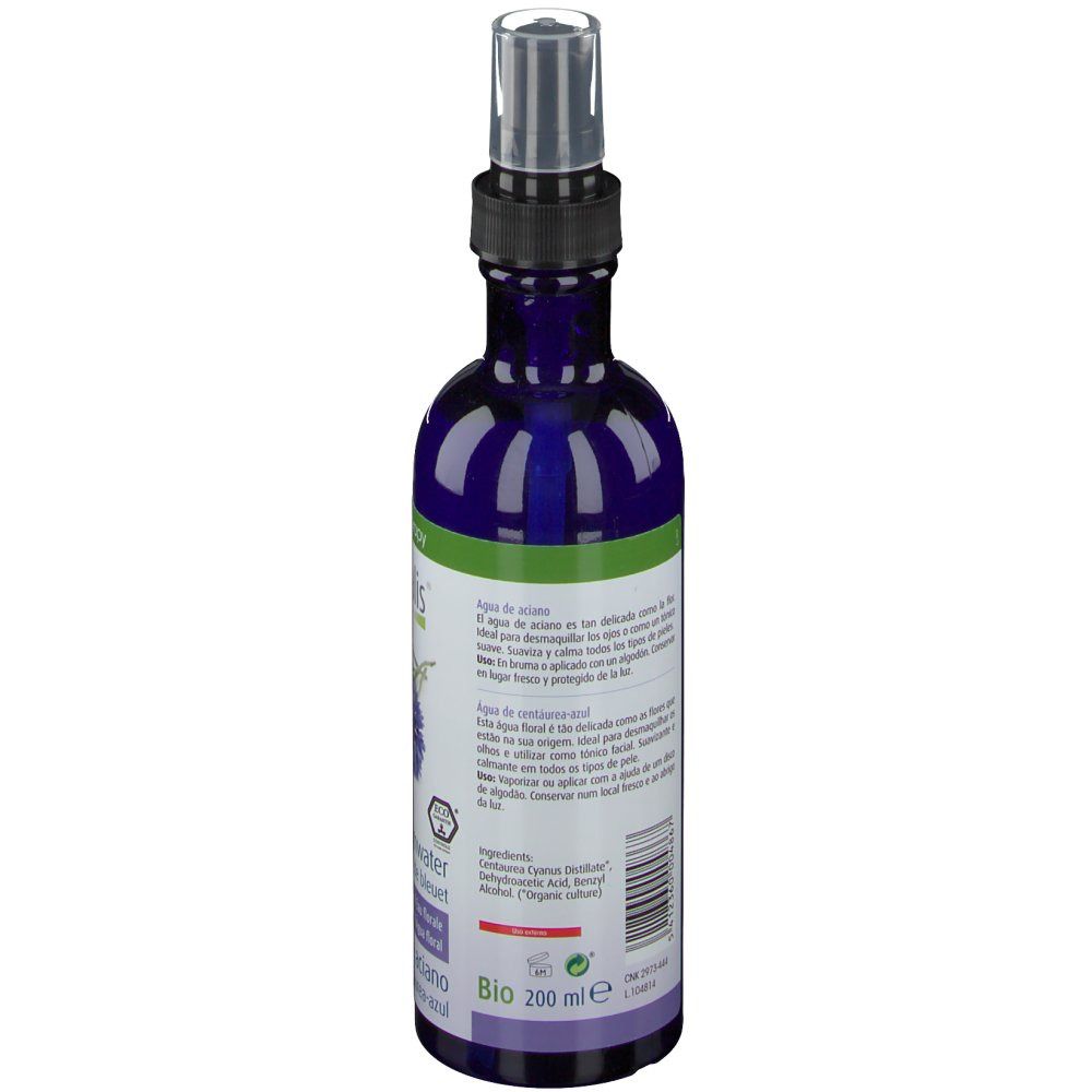 Dos d'une bouteille bleue avec vaporisateur. Texte multilingue. Certification bio.
