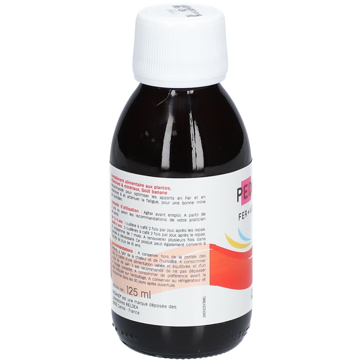 Flacon marron avec bouchon blanc. Inscription: PEDIAKID Fer + Vitamines B. Étiquette avec texte et design rouge.