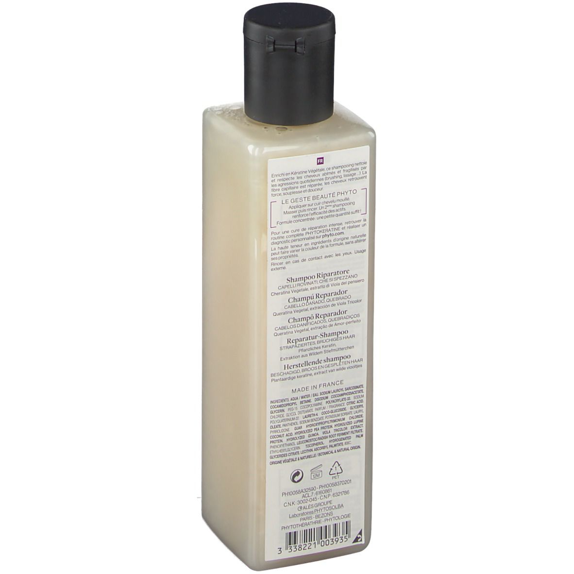 Dos d'un flacon de shampooing rectangulaire avec bouchon noir. Informations textuelles et logos.
