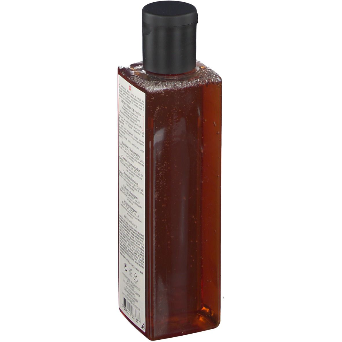 Flacon marron avec bouchon noir. Étiquette avec informations sur le produit. Vue oblique.