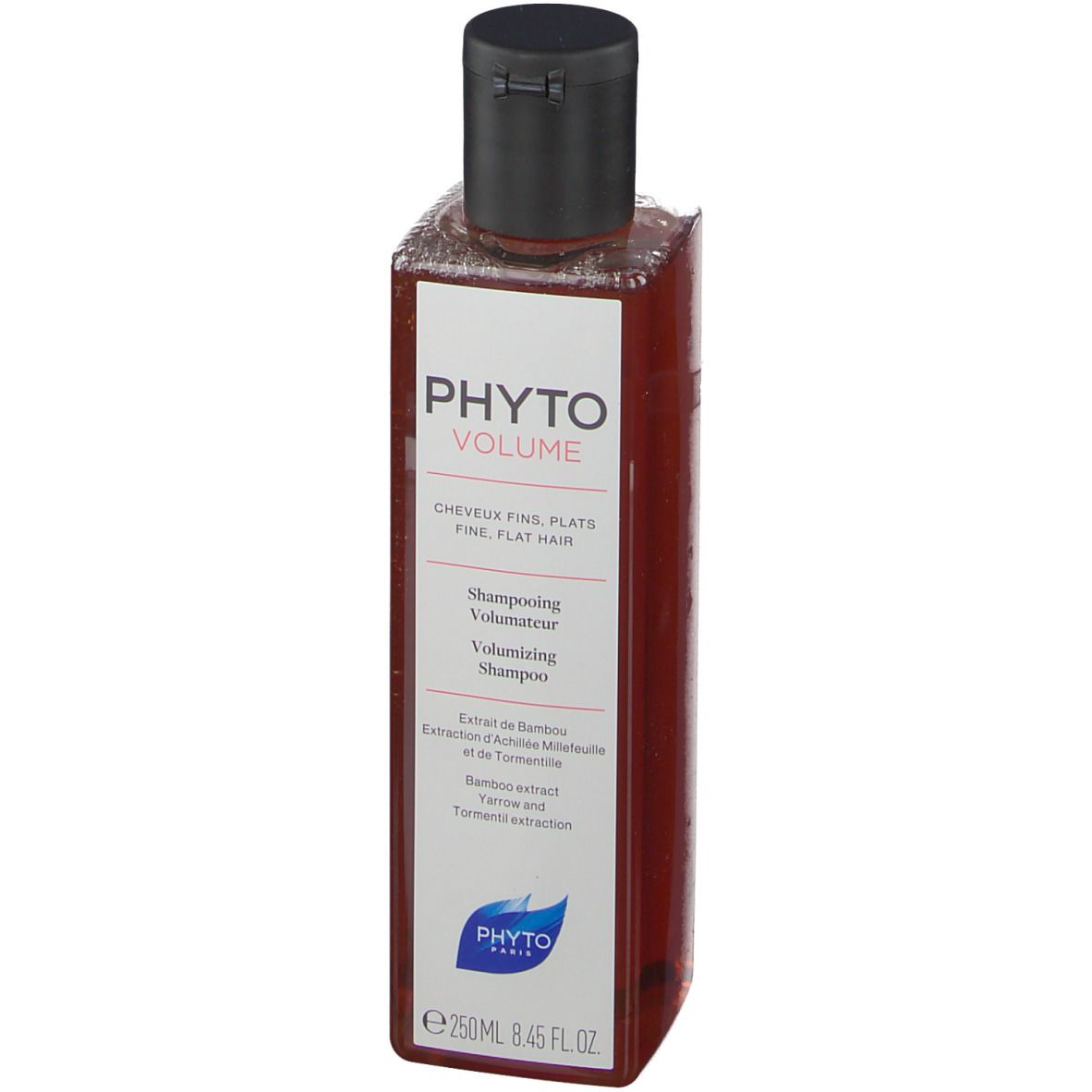 Flacon marron avec bouchon noir. Étiquette avec nom du produit et ingrédients. Shampooing volumateur.