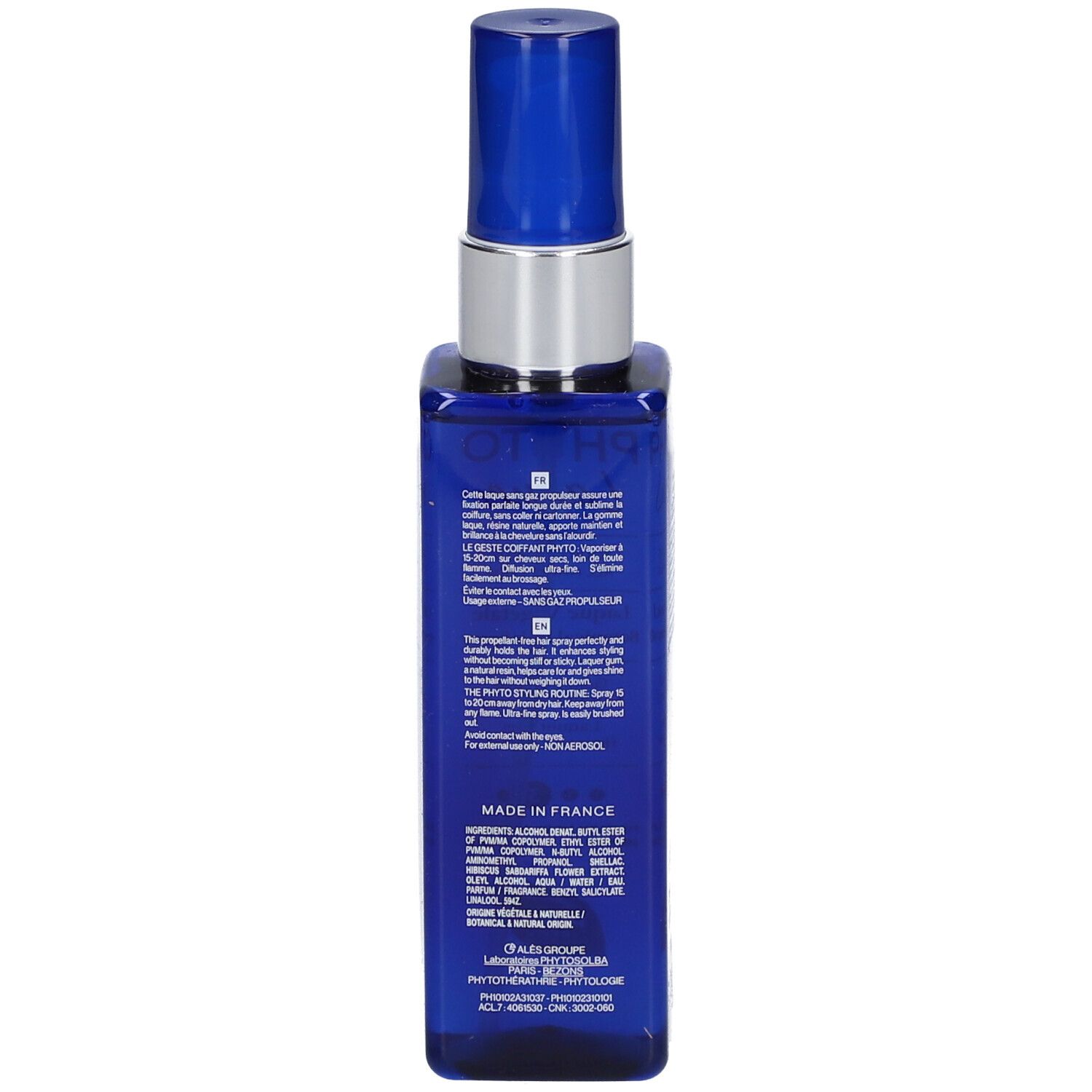 Flacon bleu de laque pour cheveux. Tête de pulvérisation argentée. Texte multilingue. Fabriqué en France.