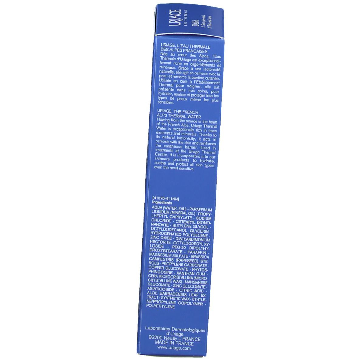 Côté de la boîte bleue. Texte multilingue. Ingrédients et informations fabricant.