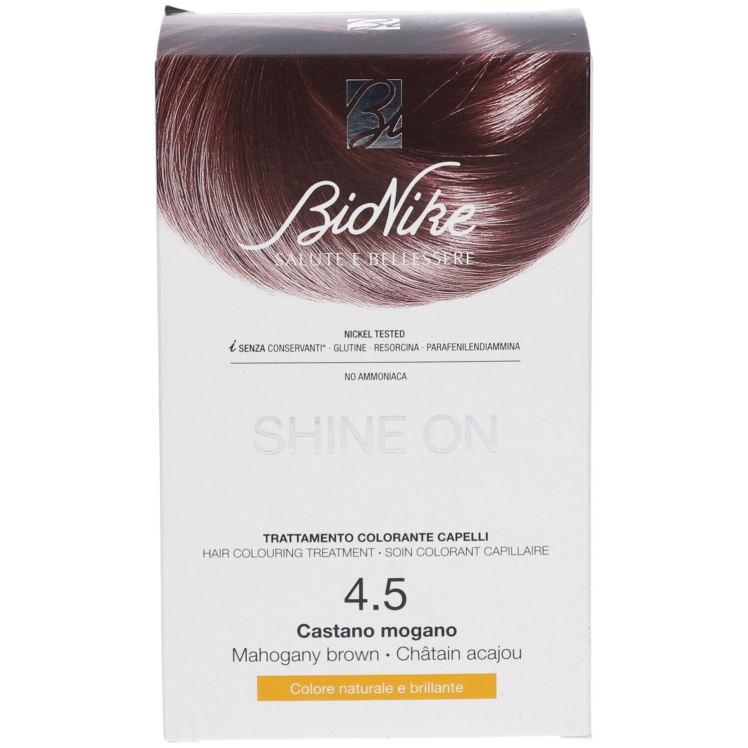 BioNike SHINE ON Haarfärbepflege 4.5 KASTANIE ACAJOU. Karton mit Produktabbildung und Schriftzug. Farbe: Kastanienbraun.