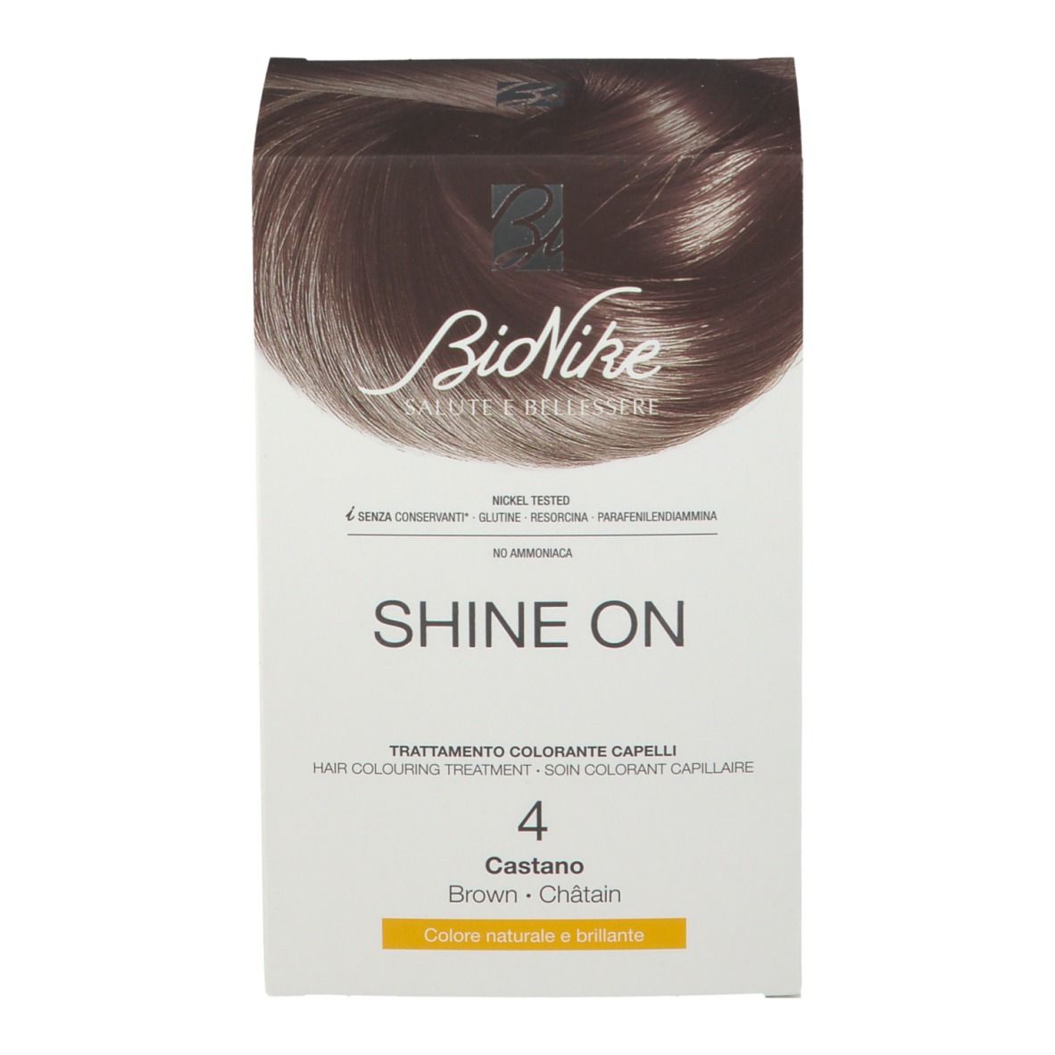 Boîte de coloration capillaire BioNike SHINE ON Braun 4. Brun châtain. Inscriptions : Nickel Tested, sans gluten, sans conservateur.