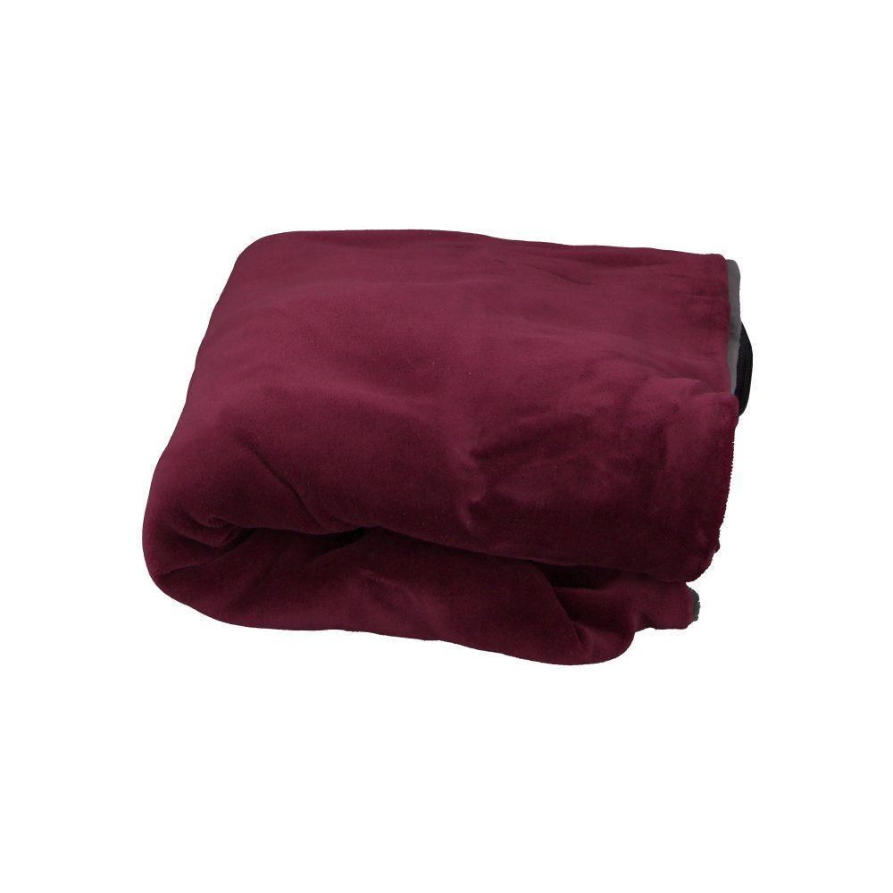 Coussin bordeaux plié. Aspect velours. Bord gris visible.
