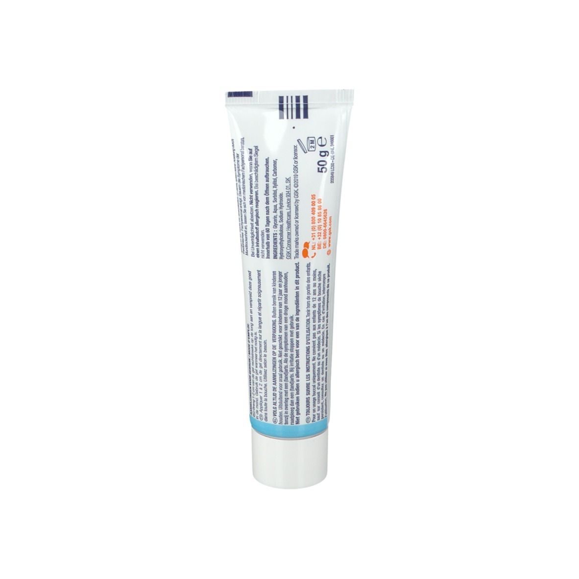 Dos d'un tube. Texte et informations en plusieurs langues. Fond blanc.