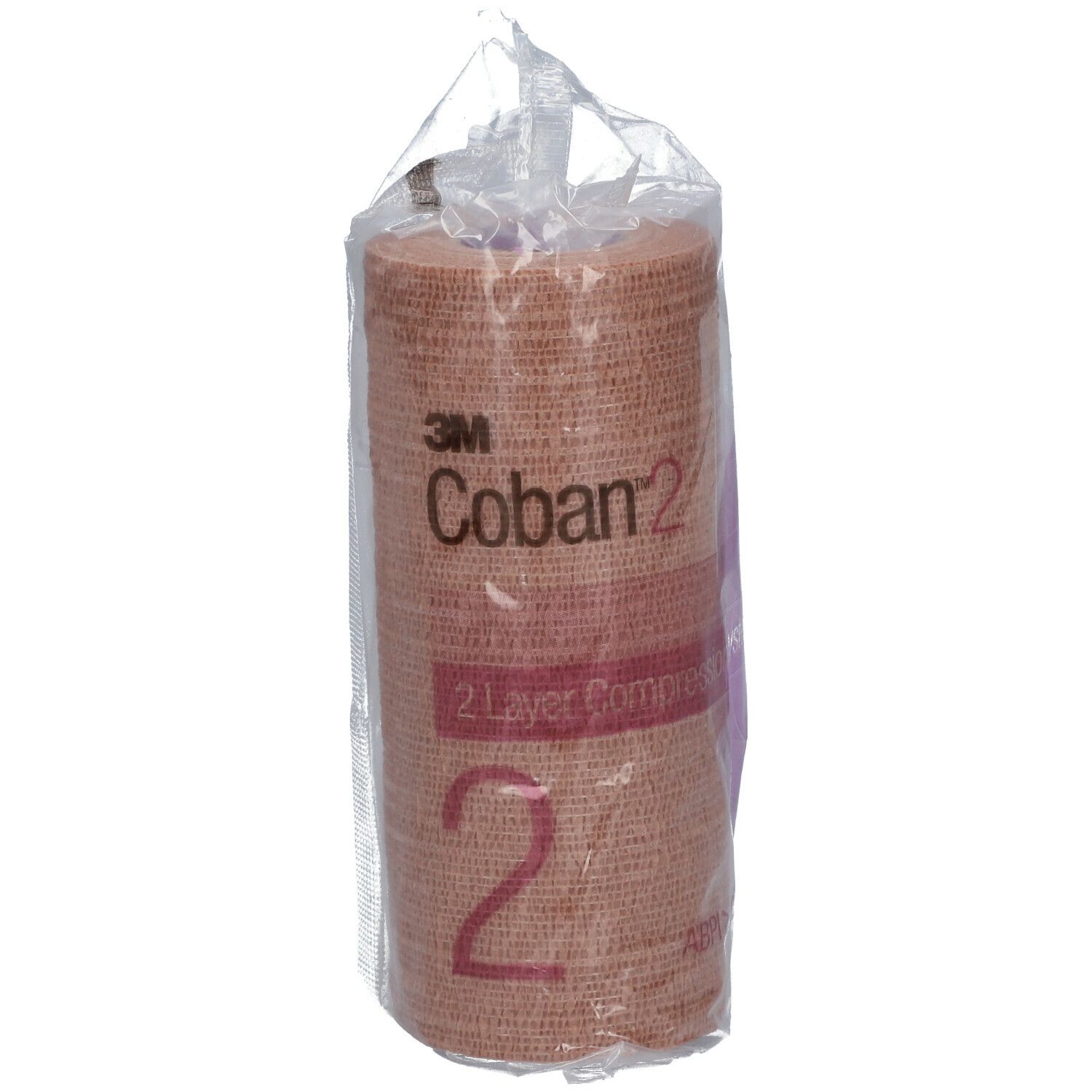 Bande de compression 3M Coban 2, beige, dans un emballage transparent. Inscription : 2 Layer Compression.