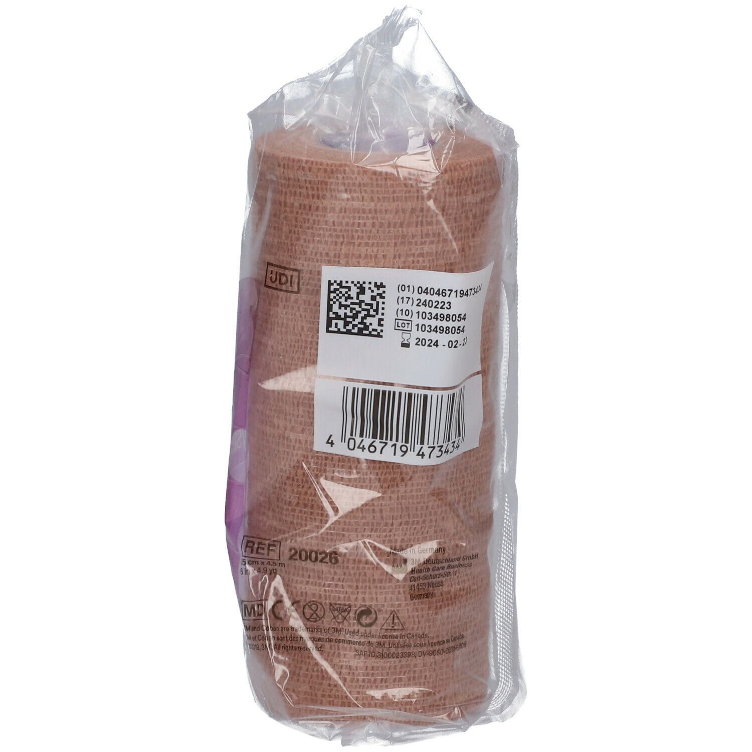 Bande de compression 3M Coban 2 beige, dans un emballage. Étiquette avec code-barres et informations.