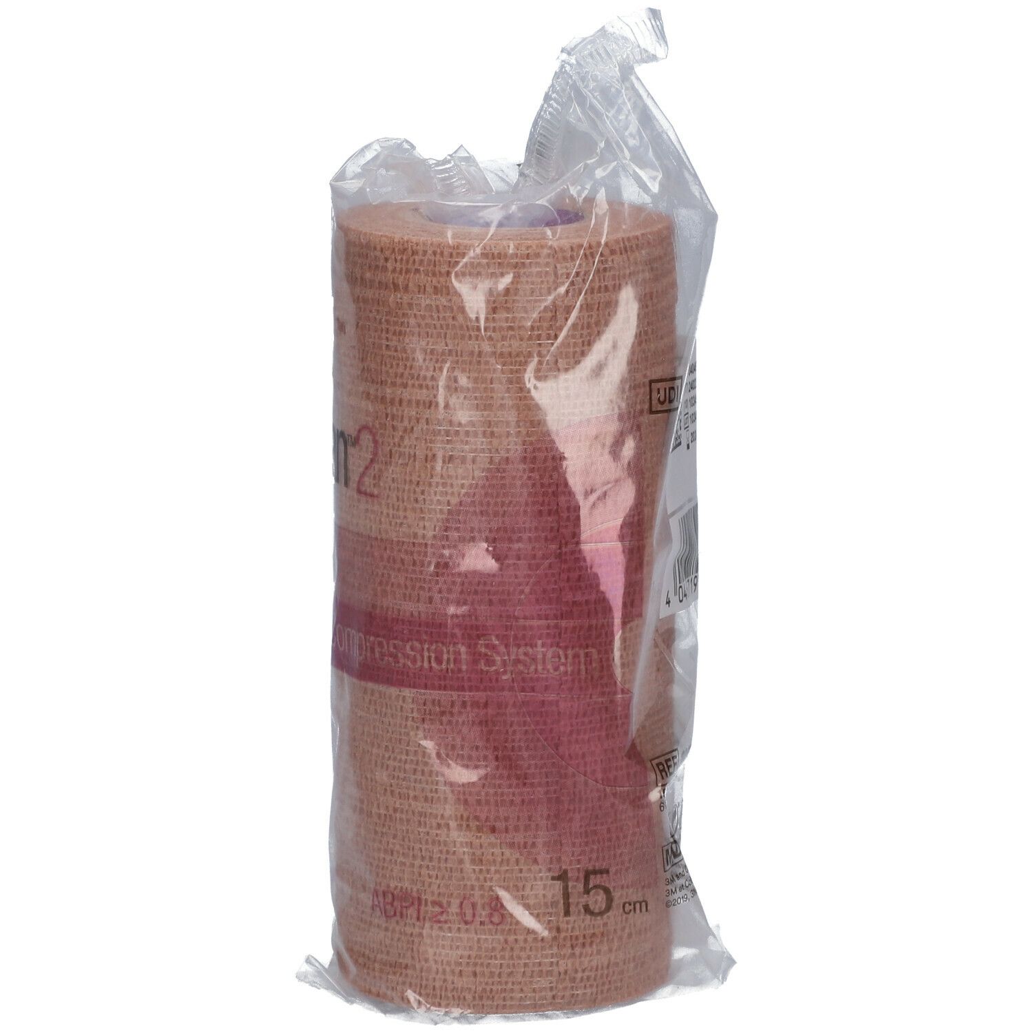 Bande de compression 3M Coban 2 beige, dans un emballage. Inscription : 15 cm.