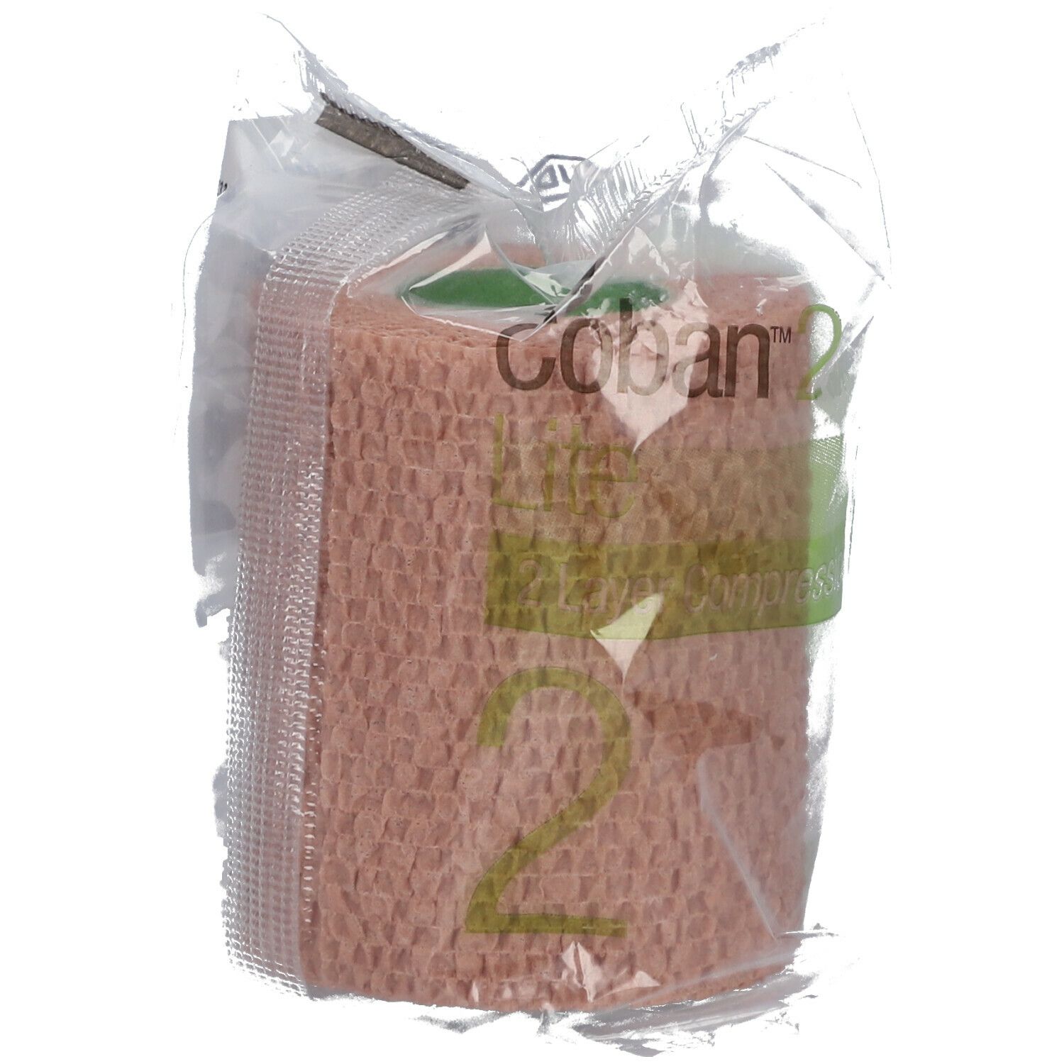 Bande de compression dans un emballage plastique. Inscription "Coban 2". Couleur beige. Écriture verdâtre.