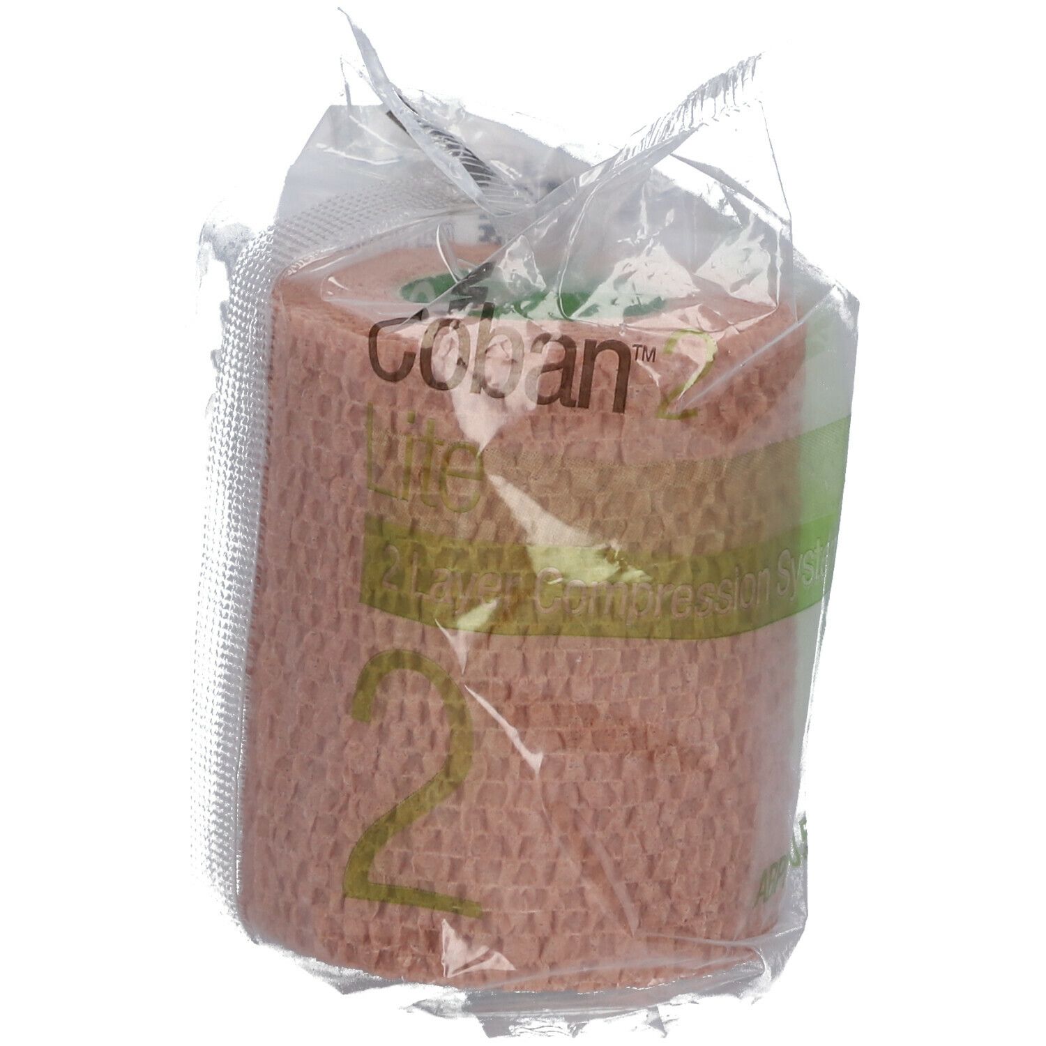 Bande de compression dans un emballage plastique. Inscription "Coban 2". Couleur beige. Écriture verdâtre.