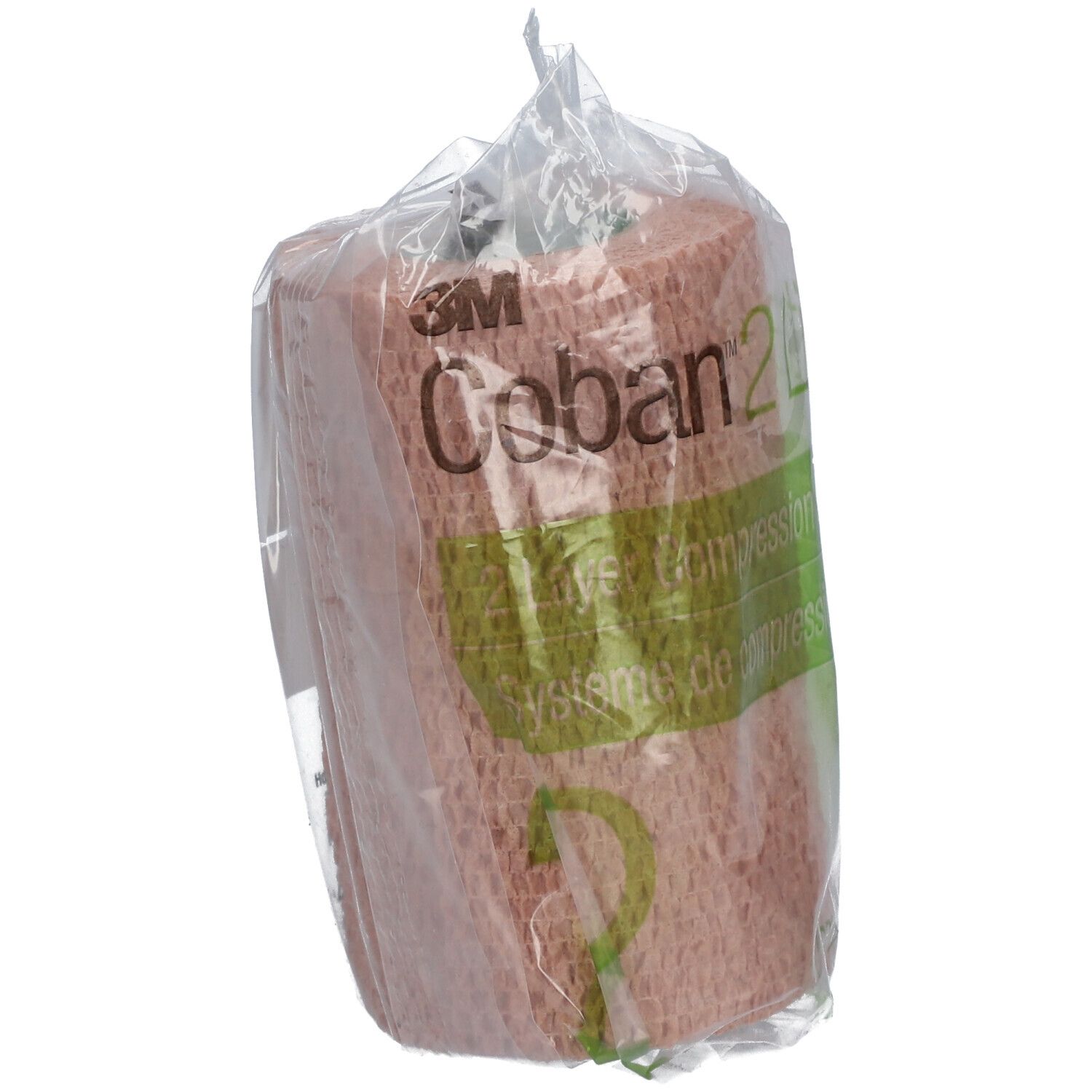 Bande de compression dans un emballage transparent. Inscription : 3M Coban 2 Lite. Couleur beige-rose.