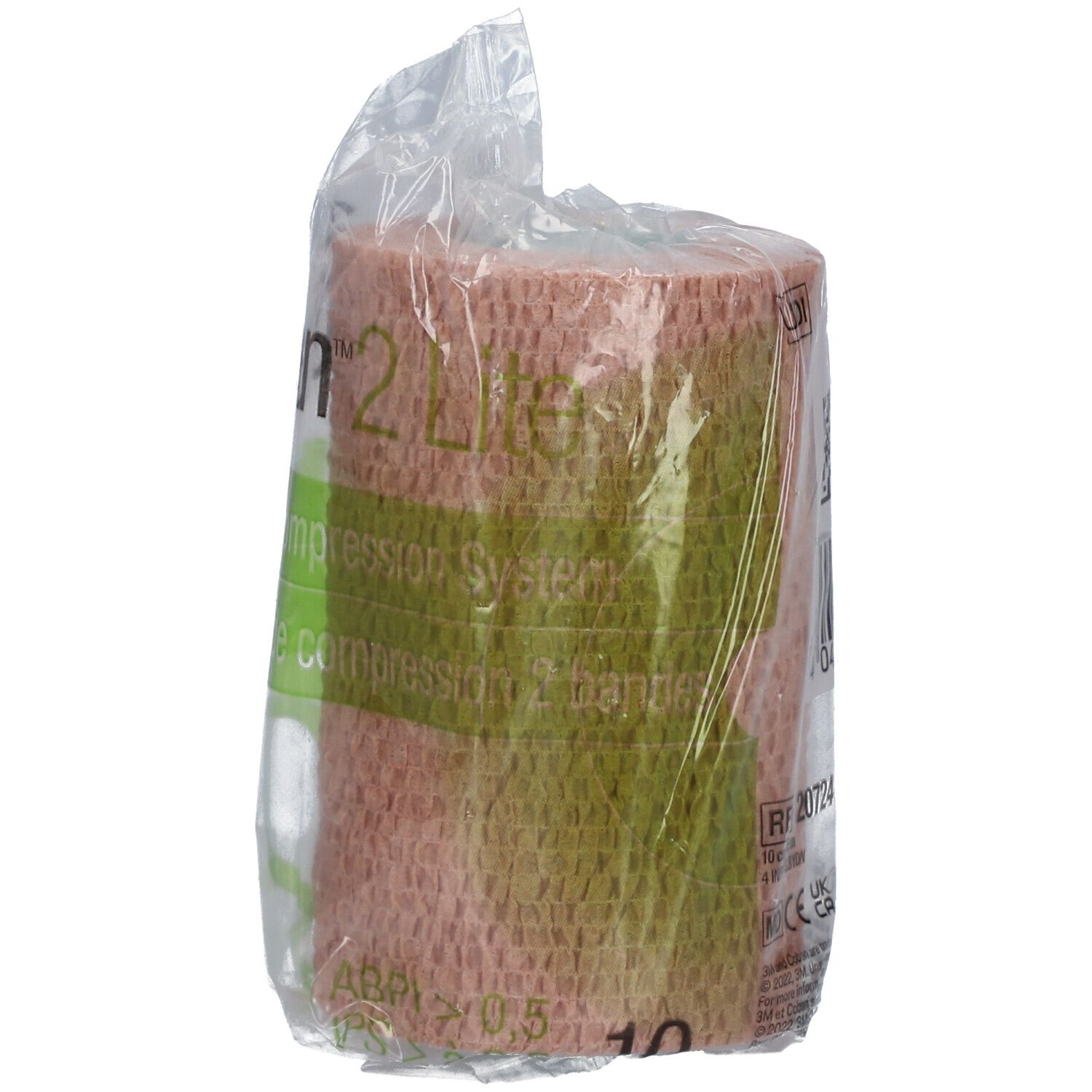 Bande de compression en emballage. Inscription : 3M Coban 2 Lite. Couleur beige-rose. Inscription : REF 20724.