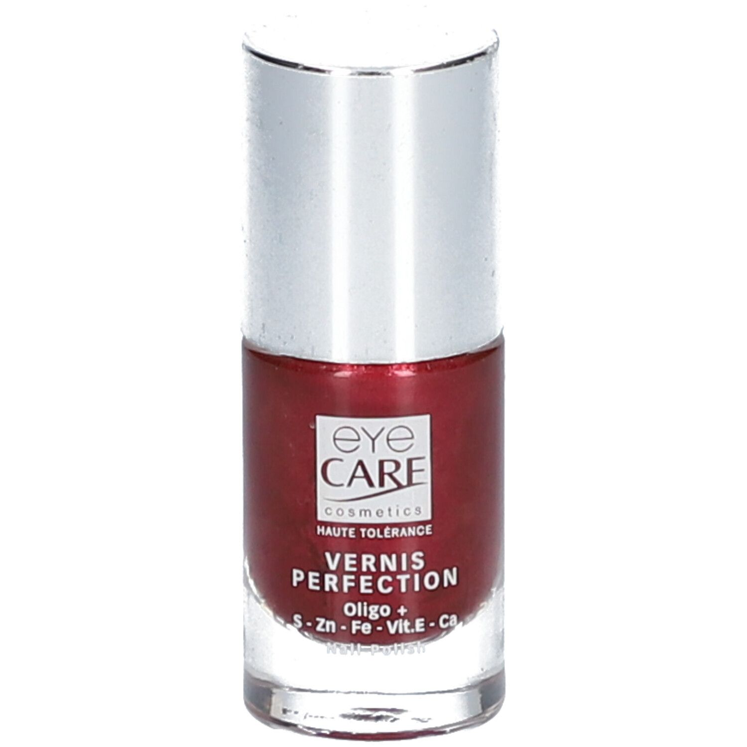 Flacone di smalto con tappo argentato. Scritta: Eye Care Cosmetics, Vernis Perfection, colore rosso rubino.